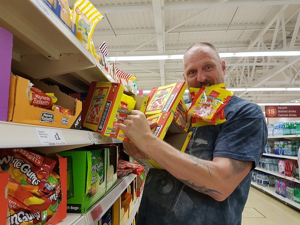 Chris buying his favourite sweets at the supermarket (Collect/PA Real Life) NOTE TO EDITORS: This image must only be used in conjunction with PA Real Life story REAL LIFE CatCrash. All usage is subject to a fee or incorporated into your outlet’s agreed content package. Find copy in full on PA Explore or contact PA Real Life at RealLife2@pamediagroup.com or on 020 7963 7175 for access or queries