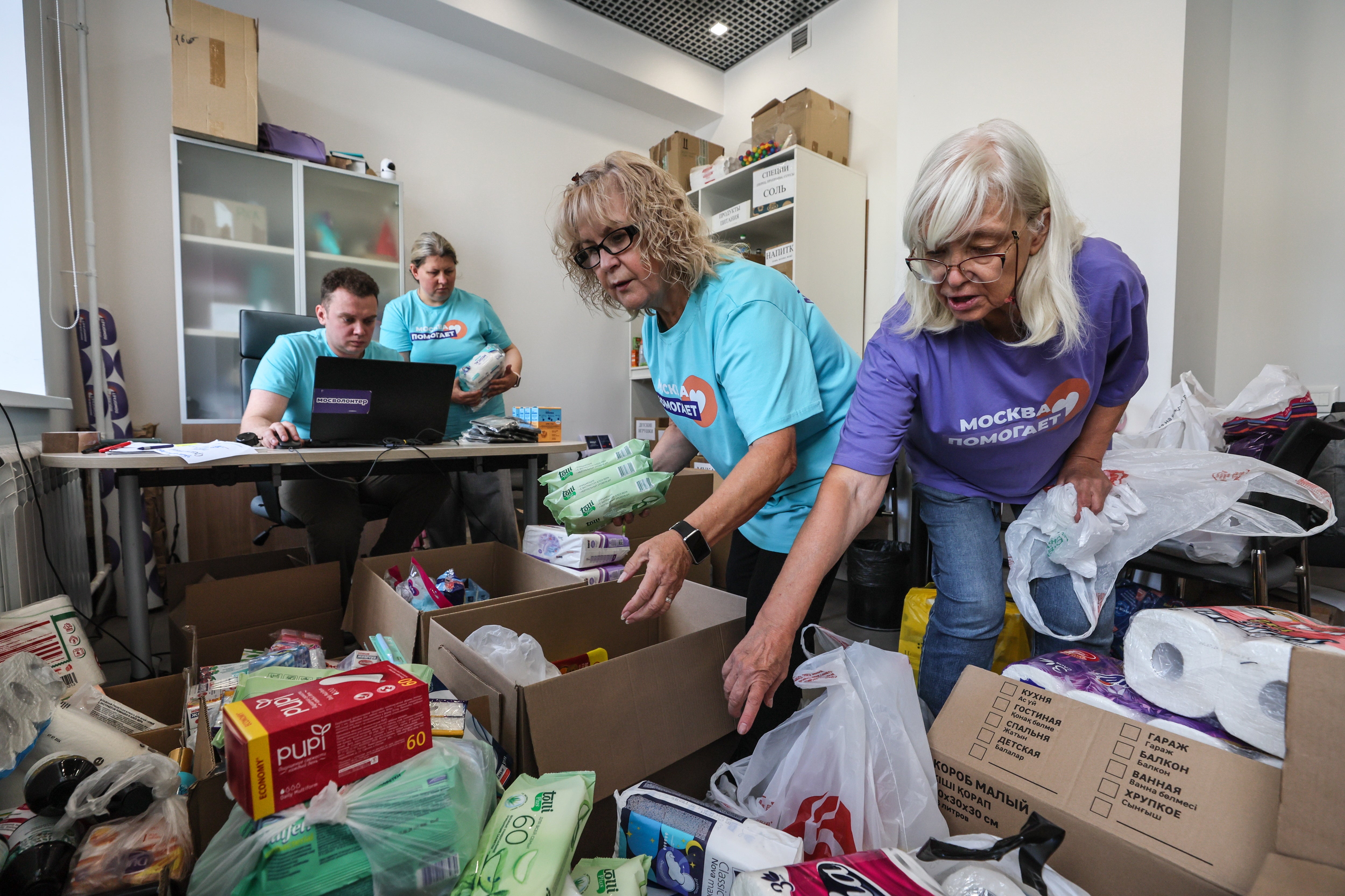 Volunteers sort a humanitarian aid for residents of Kursk region at the humanitarian collection point 'Moscow Helps' in Moscow, Russia