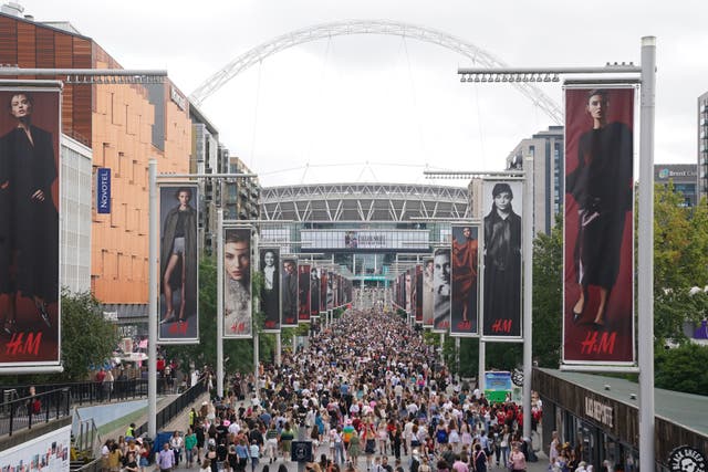 Fans gather outside Wembley Stadium in north west London, ahead of Taylor Swift’s latest Eras Tour concert. Picture date: Thursday August 15, 2024.