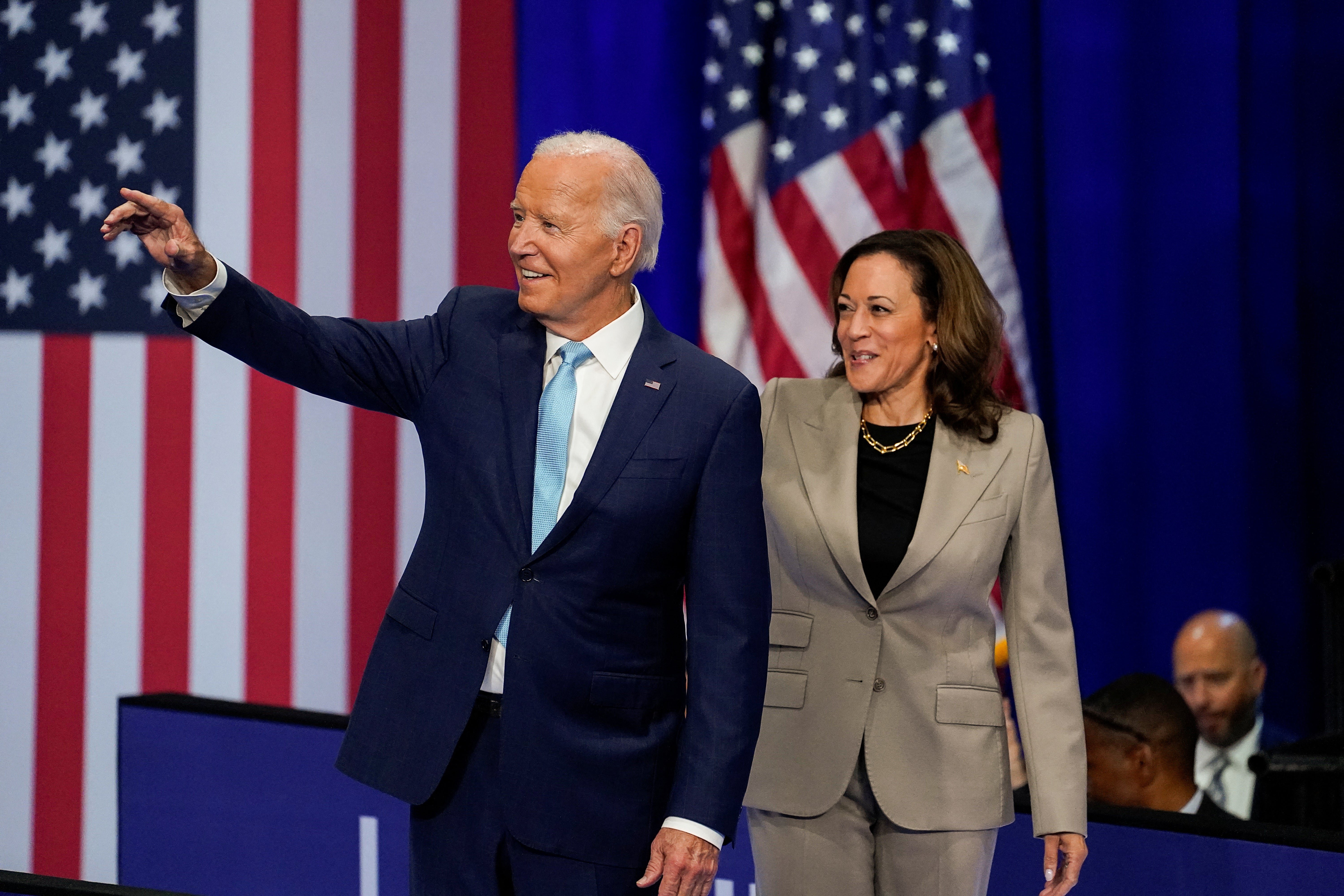 U.S. President Joe Biden and Vice President Kamala Harris walk out together at an event on Medicare drug price negotiations on August 15