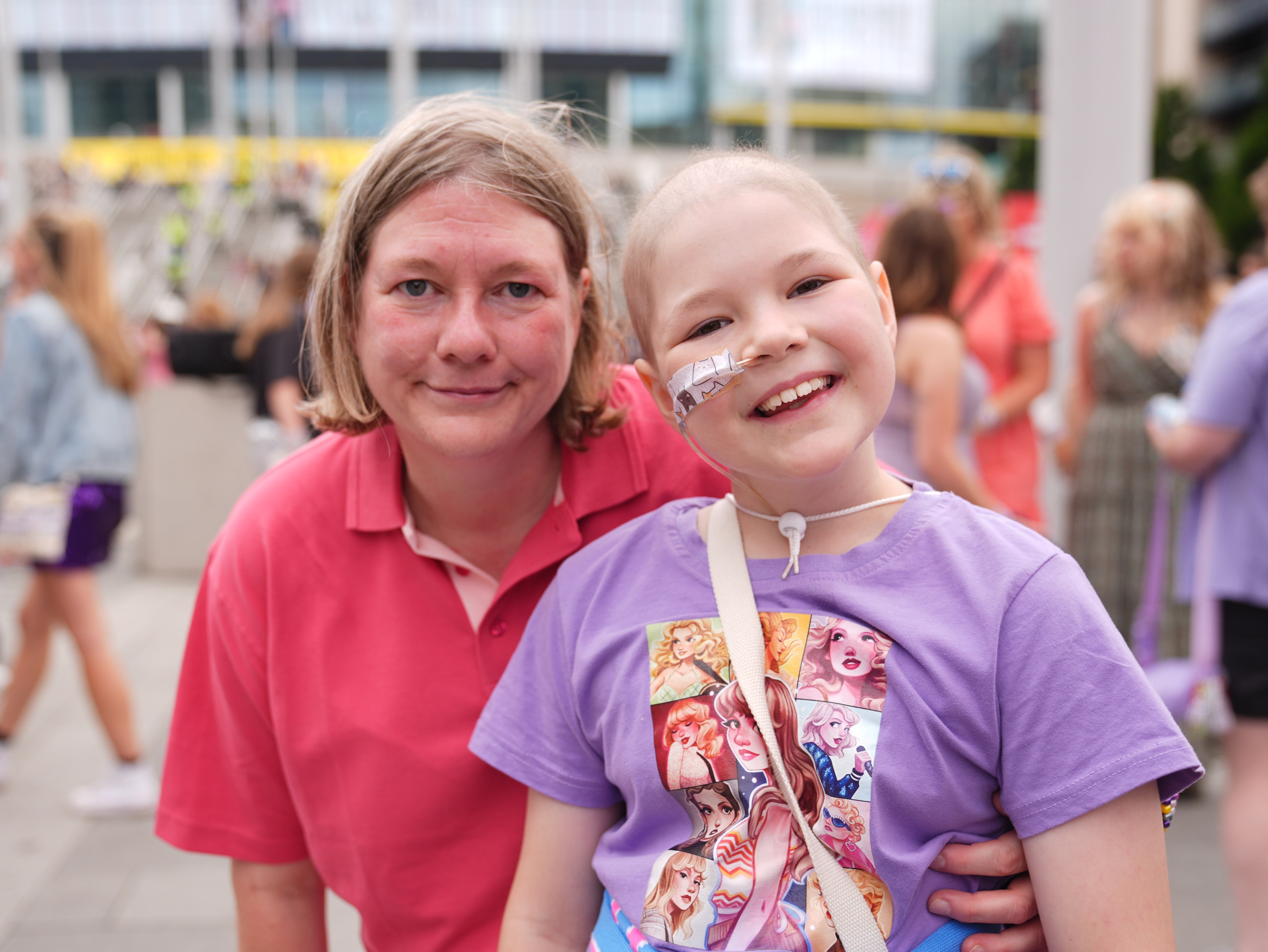 Sophie and Angela Hutton, from Sutton, said they couldn’t wait to see the singer after Sophie spent 72 days in Great Ormond Street Hospital (James Manning/PA)