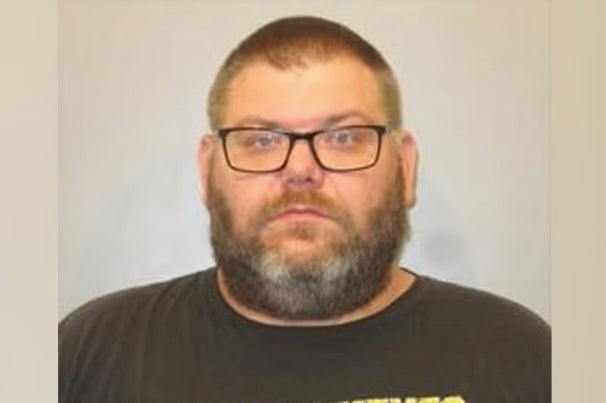 A mugshot of David Carpenter, an Iowa man who allegedly shot his father in the face on August 11 in a dispute over smelly feet.