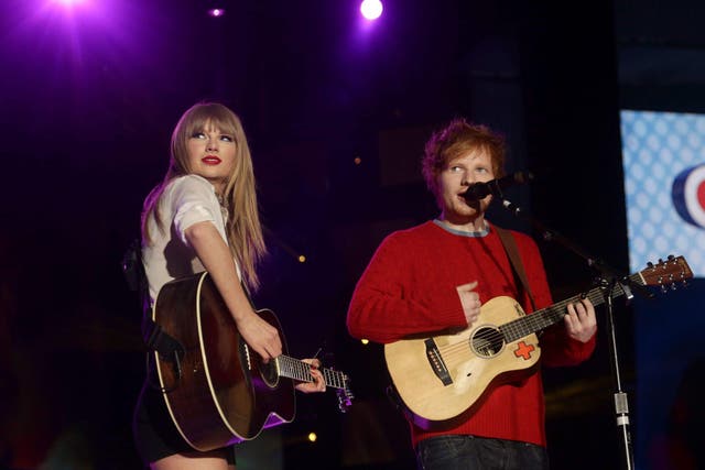 <p>Taylor Swift and Ed Sheeran, pictured in 2013. (Yui Mok/PA)</p>