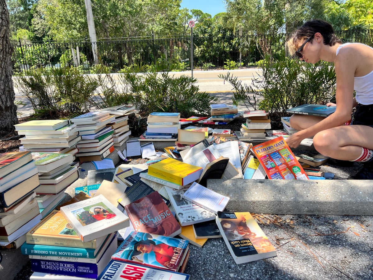 Heaps of books tossed in trash by Florida college – including many focusing on LGBTQ and race issues