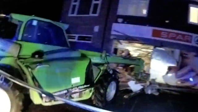 <p>Burglars try to steal cash machine in botched ram raid driving stolen digger.</p>