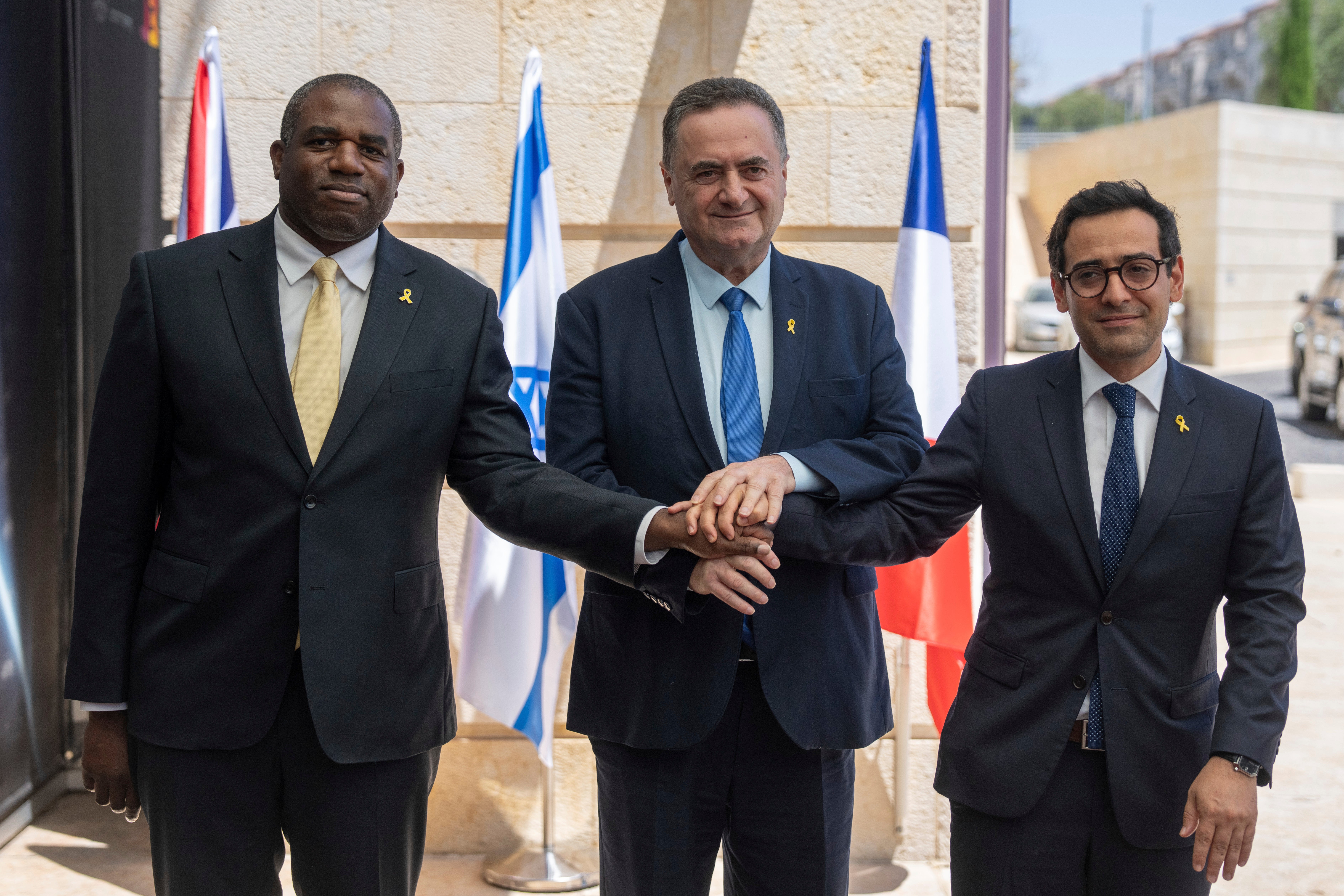 Foreign ministers David Lammy, left, and Stephane Sejourne of France, right, are welcomed by their counterpart Israel Katz in Jerusalem