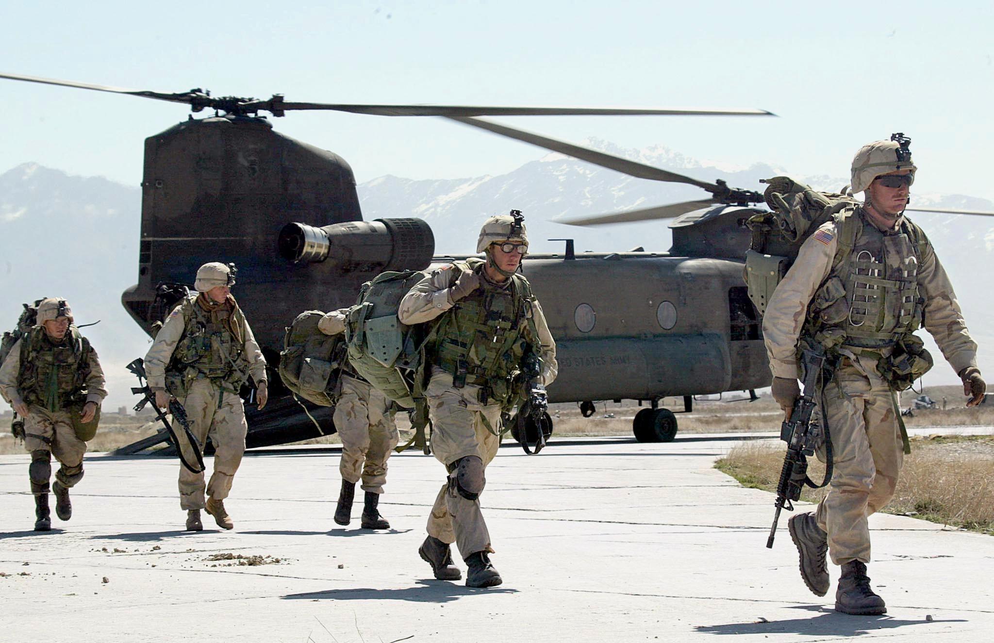 US soldiers arrived at Bagram Air Base after returning from the Arma mountain region in March 2002