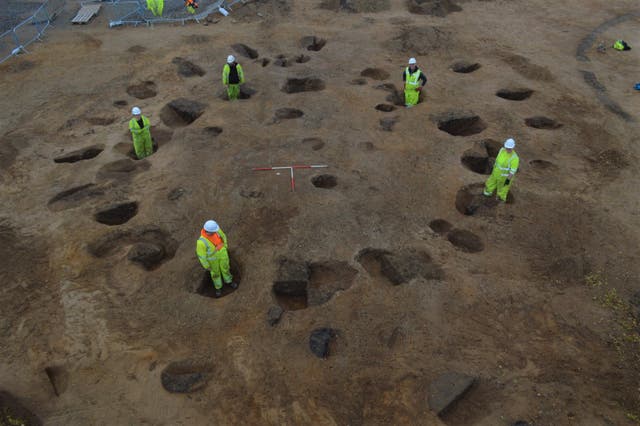 <p>The 16 roundhouses on the site survived as circular arrangements of post-holes (AOC Archaeology/PA)</p>