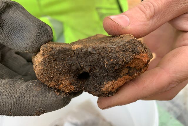 Clay mould fragments found at the site may have been used to cast objects up to 3,000 years ago (AOC Archaeology Group/PA)