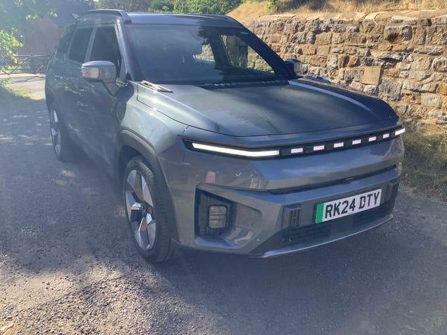 <p>The slim front light bar with six white LEDs gives the KGM Torres EVX the look of having dragon’s teeth – which is apt, given their badge </p>