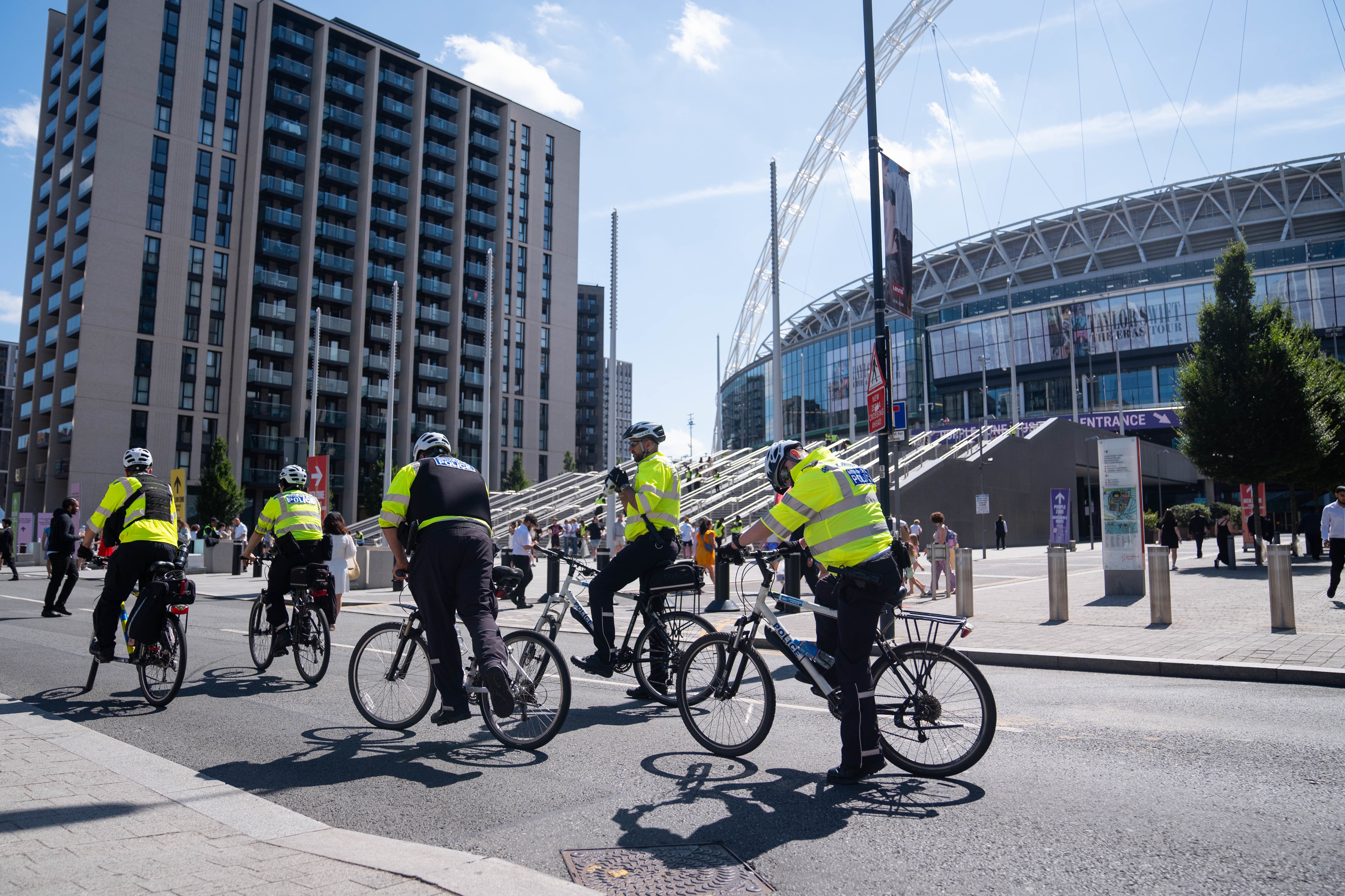 Police officers outside Wembley Stadium (James Manning/PA)