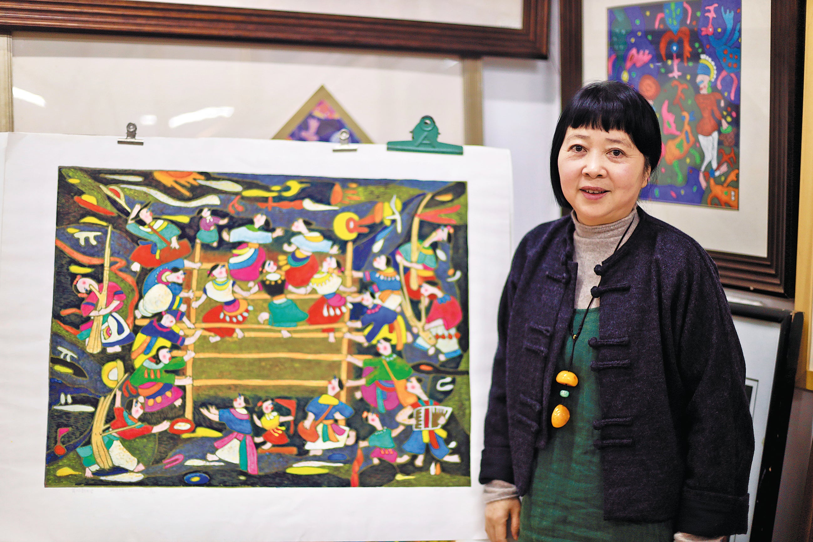 Li shows her work ‘Bamboo Pole Dance’ at her studio