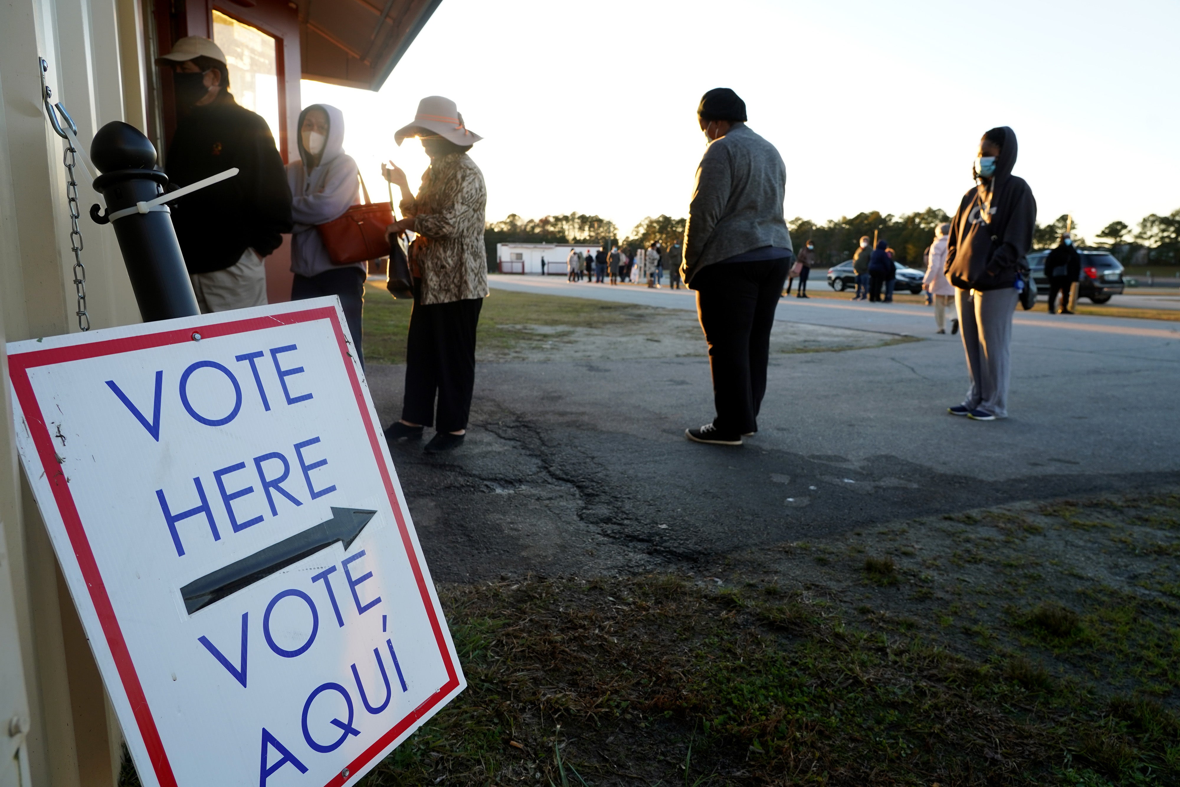 People line up to vote in Atlanta, Georgia in 2020. The Cobb County Board of Commissioners approved funding to buy panic buttons for election workers amid rising threats against them