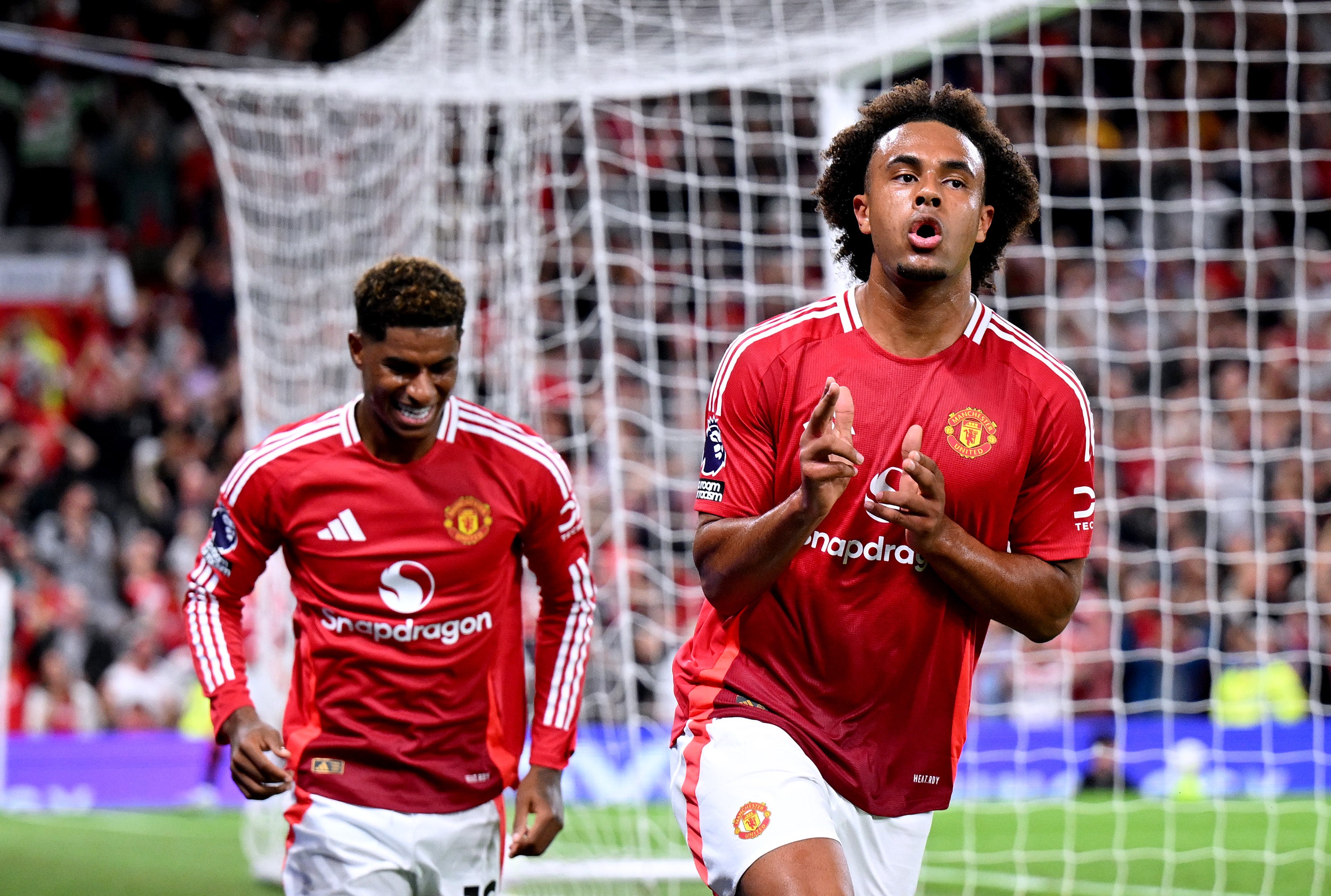 Joshua Zirkzee celebrates scoring for Manchester United.