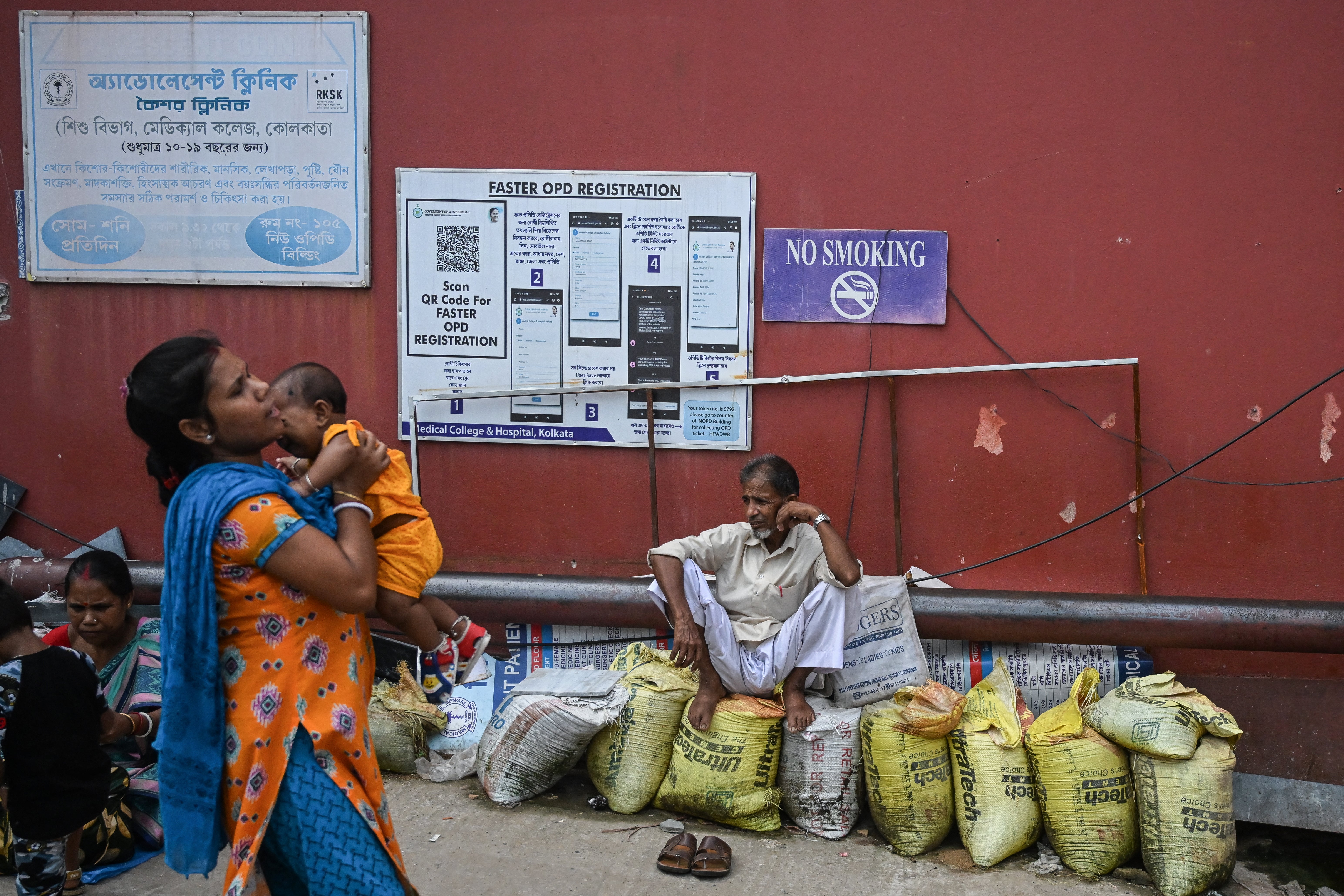 People wait at a government hospital during doctors’ nationwide strike