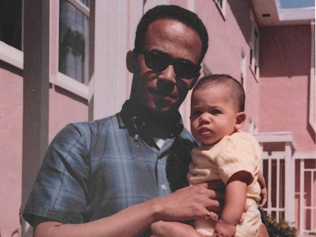 <p>Donald Harris on his way to a doctorate in economics at Berkeley in April 1965 while holding Kamala</p>