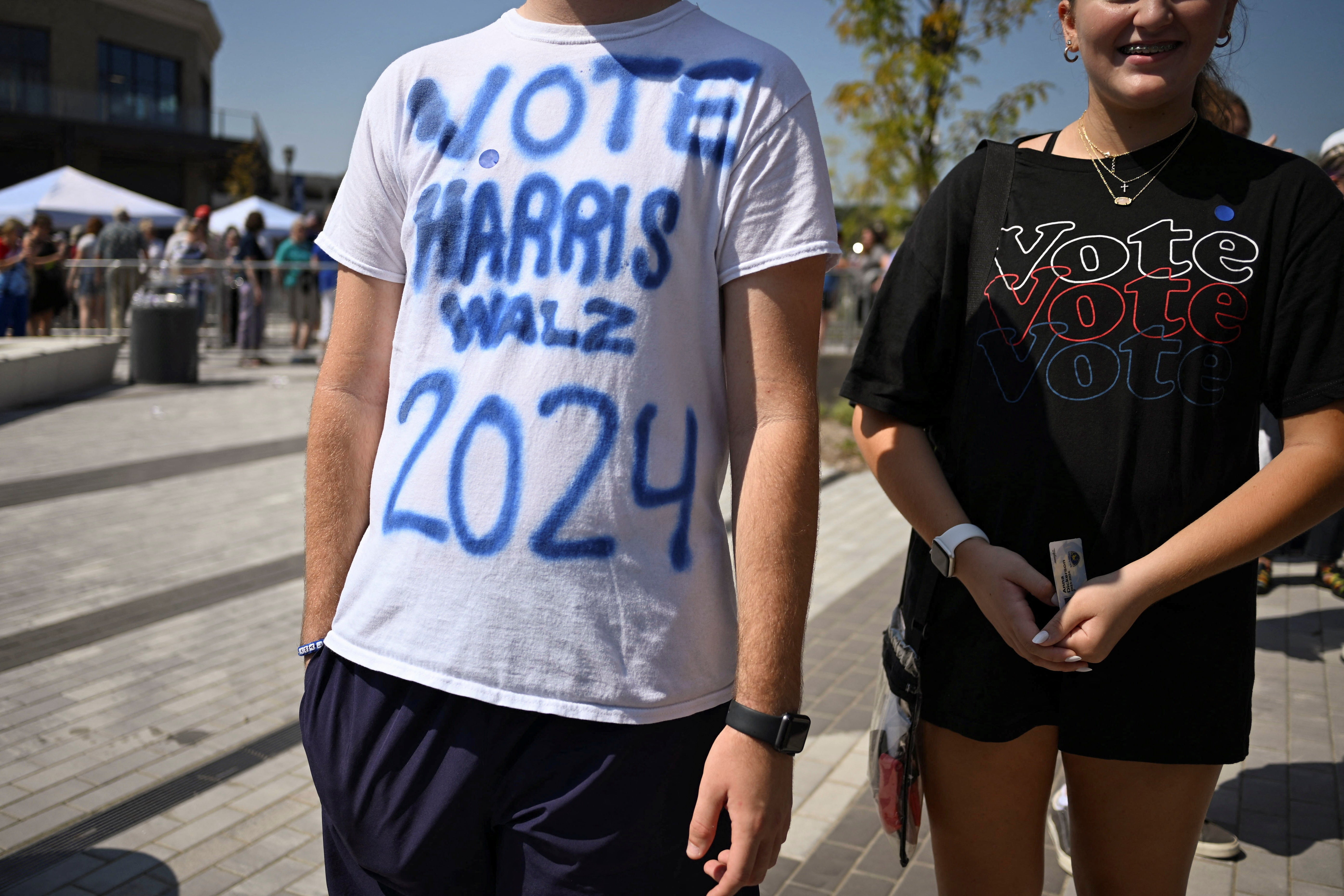 Steven Dickerson, 16, wears a homemade t-shirt that reads ‘Vote Harris Walz 2024’ while waiting in line before U.S. Democratic vice presidential candidate, Minnesota Governor Tim Walz speaks during a campaign visit to his home state in Omaha, Nebraska, U.S. August 17,