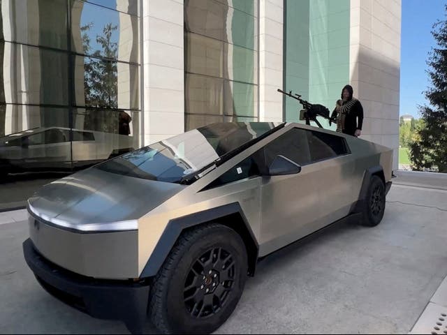 <p>Leader of Russia’s Chechnya region Ramzan Kadyrov is seen atop what is said to be a Tesla Cybertruck equipped with a machine gun, in Grozny, Russia, in this still image from video published August 17, 2024</p>