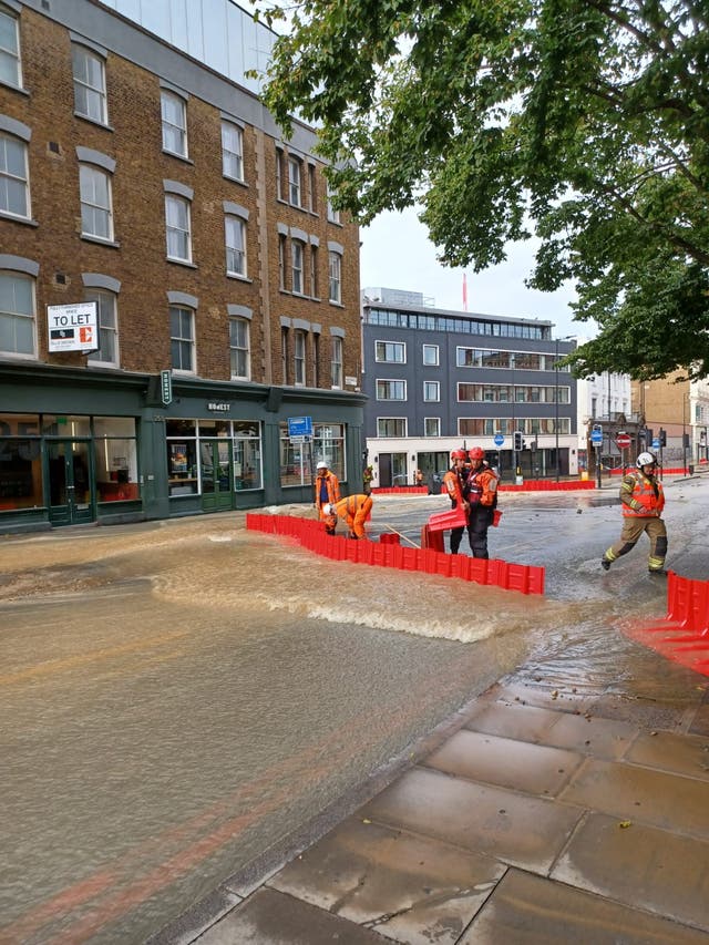 <p>Crews trying to divert flood water near King’s Cross station </p>