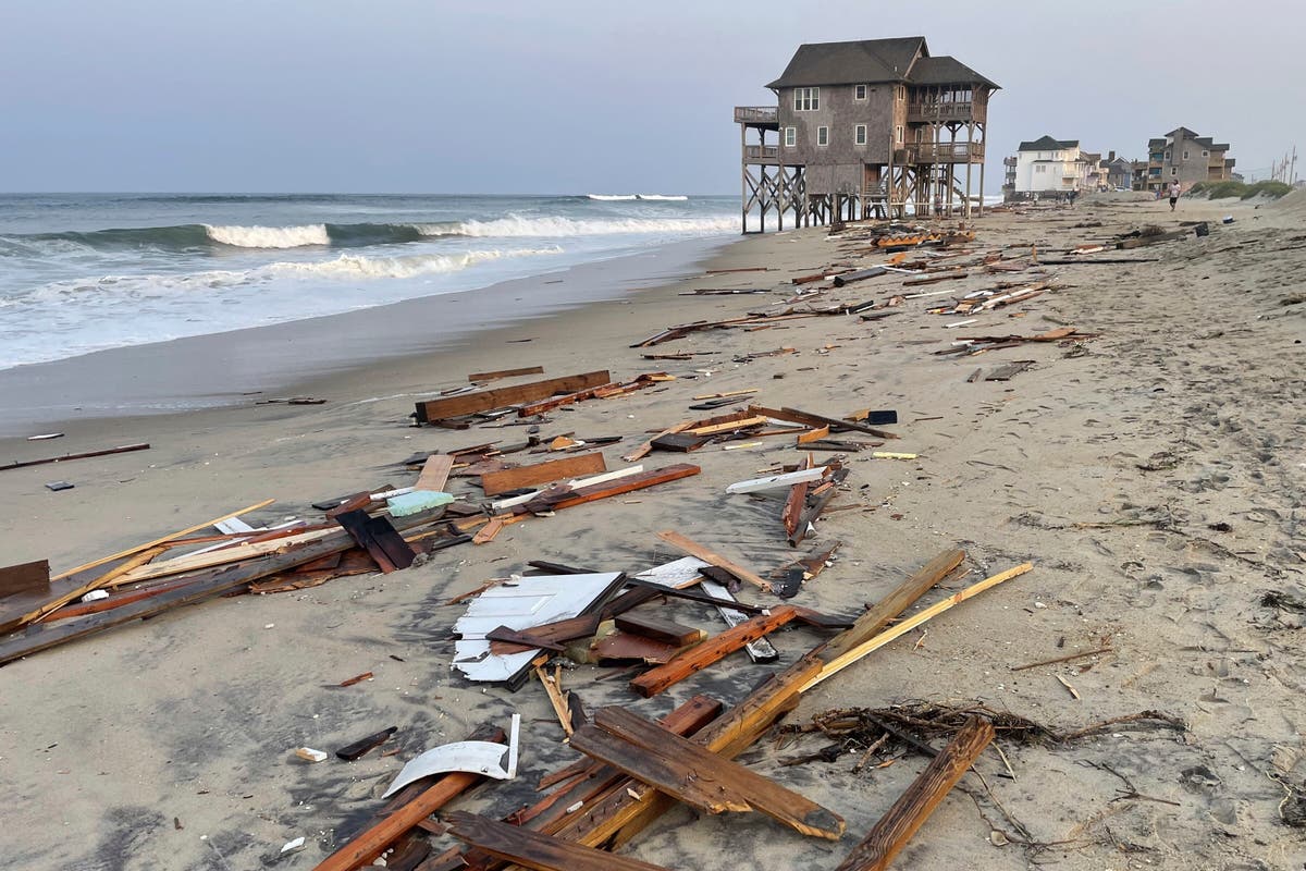 Ernesto gains strength over open Atlantic. Unrelated downpours in Connecticut lead to rescues