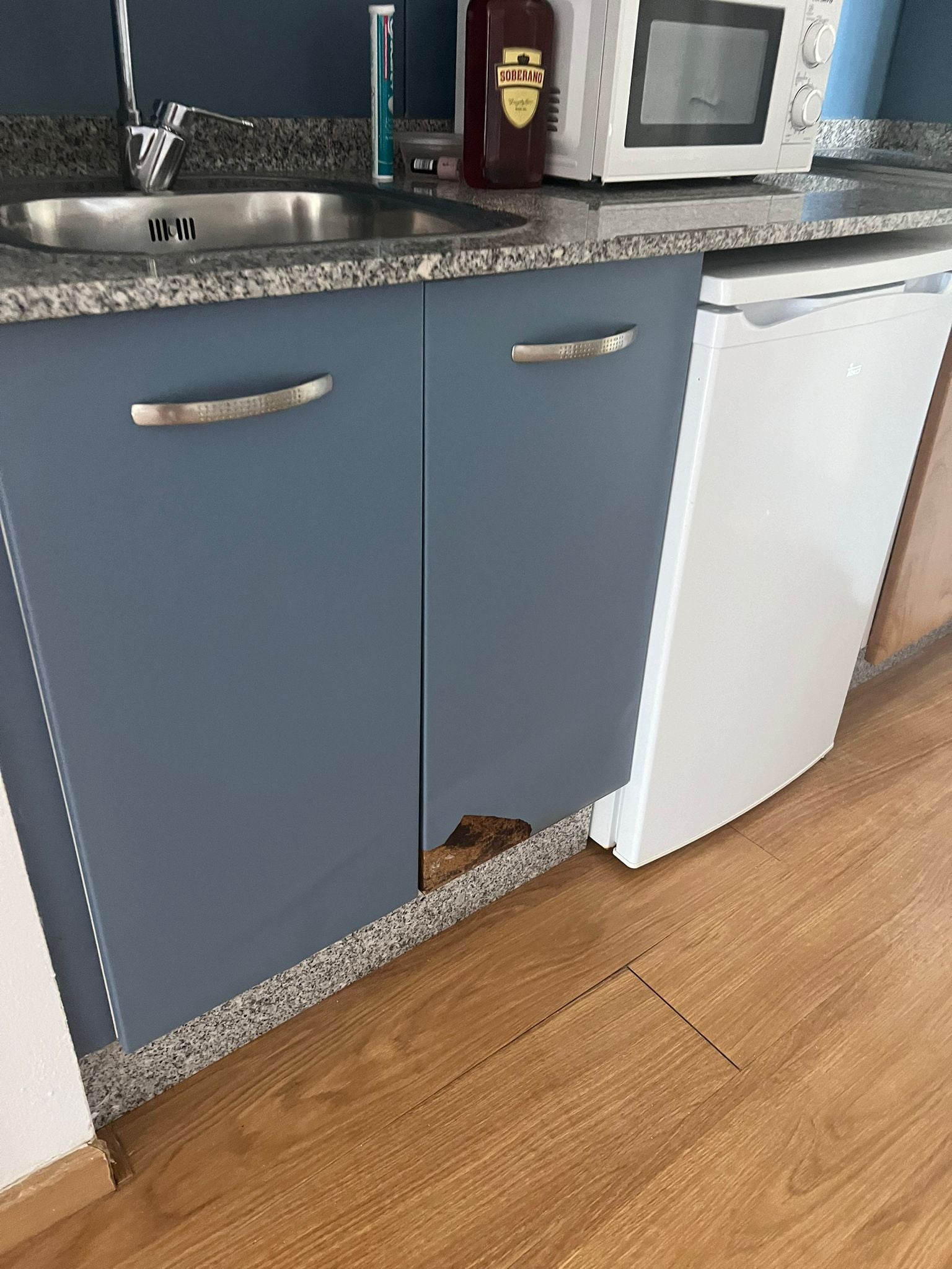 A broken cupboard in one of the rooms at the hotel