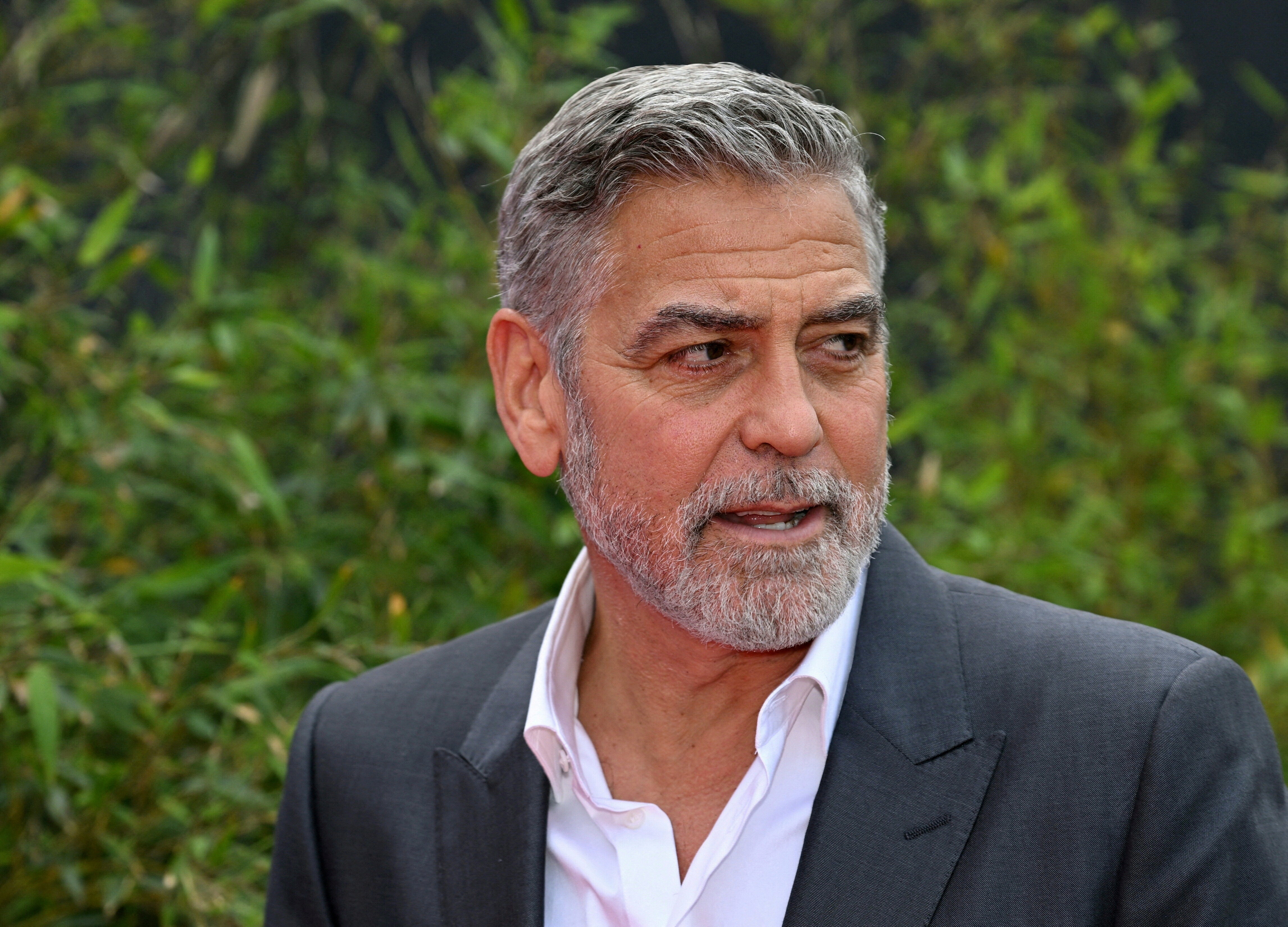 Actor and human rights activist George Clooney arrives on the red carpet for the Charity Gala of the German Postcode Lottery under the theme 'Stand Up For Human Rights' in Duesseldorf, western Germany