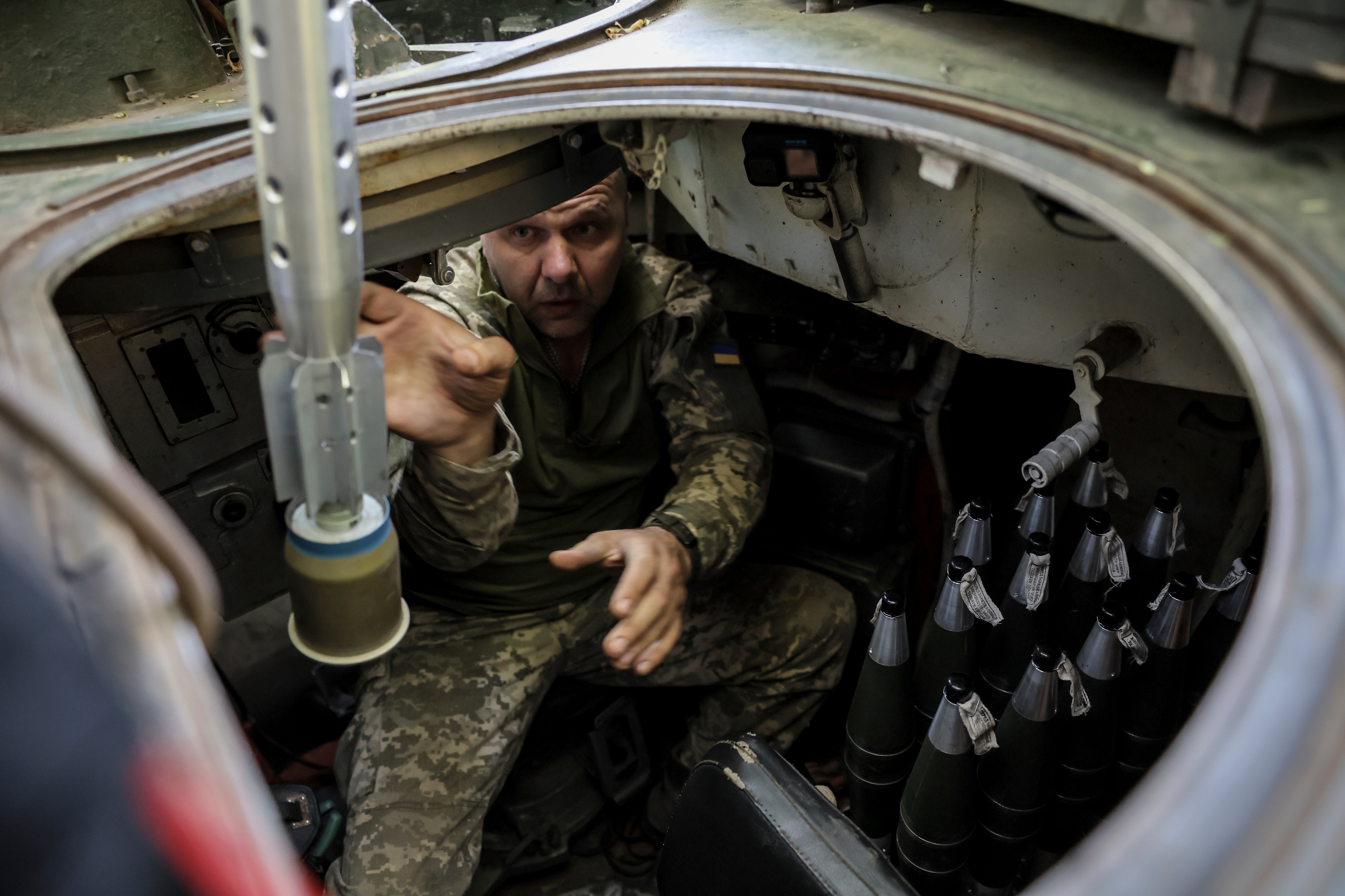 Servicemen of 24th mechanised brigade prepare to fire BRM1k infantry fighting vehicle towards Russian positions near Chasiv Yar town, in Donetsk region, Ukraine