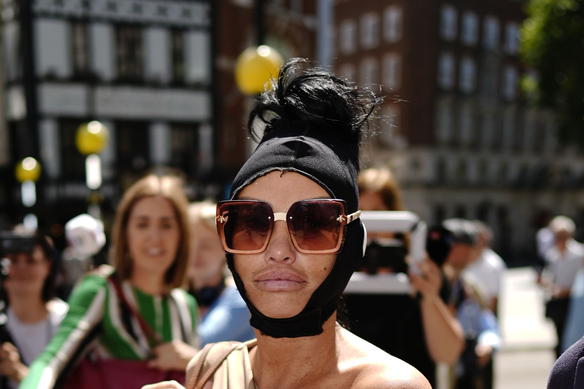 Ms Price outside the Royal Courts of Justice in London before an earlier hearing (PA Wire)