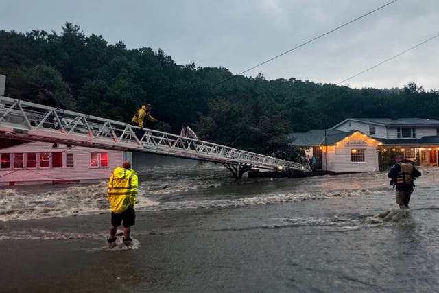 <p>This photo of a fire station in Beacon Falls, Connecticut, shows members of Beacon Hose Co. rescuing people from the Brookside Inn in Oxford, Conn., on Aug. 18</p>