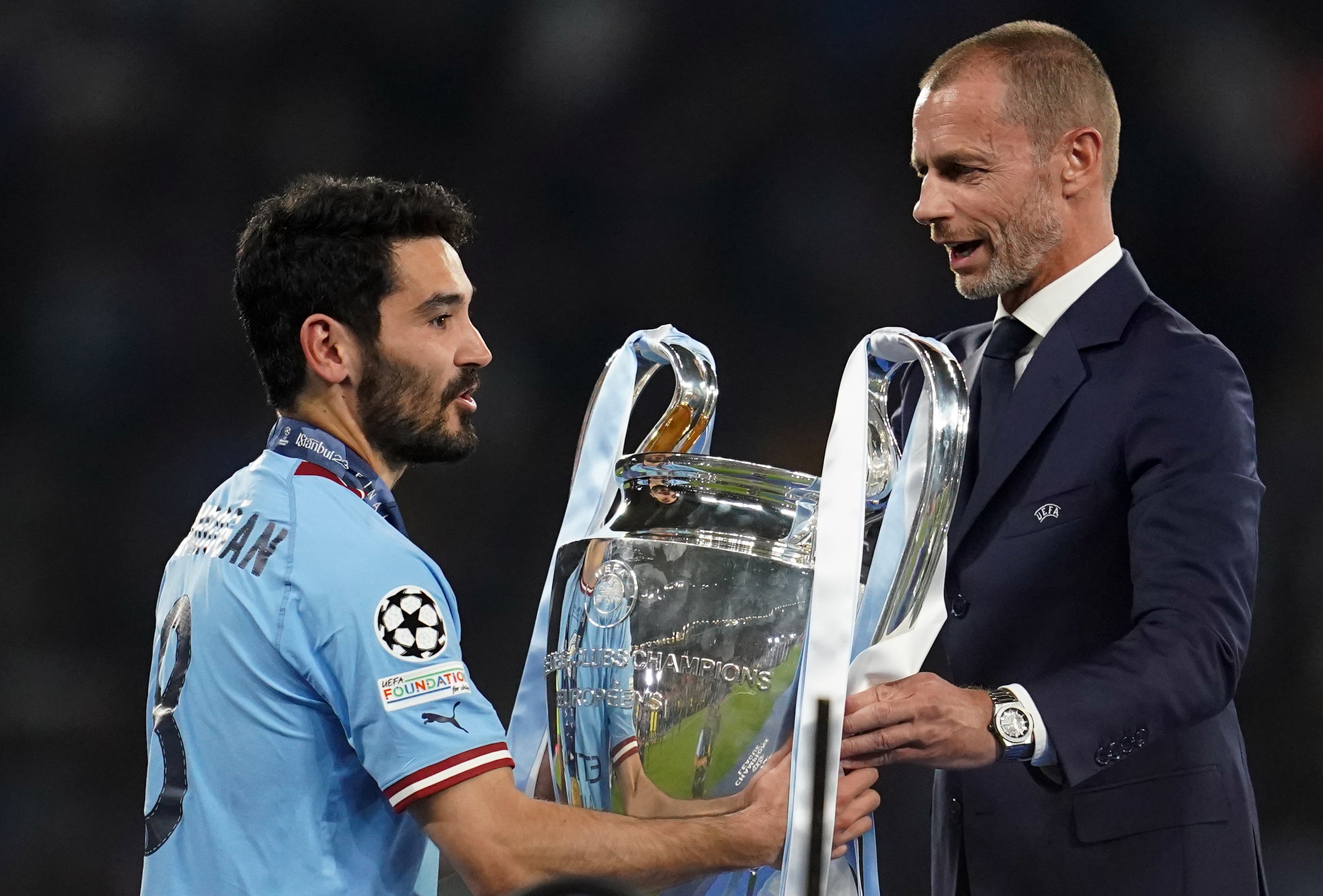 Ilkay Gundogan, pictured accepting the trophy following Manchester City’s Champions League triumph in 2023, has been linked with a return to the Etihad Stadium (Nick Potts/PA)