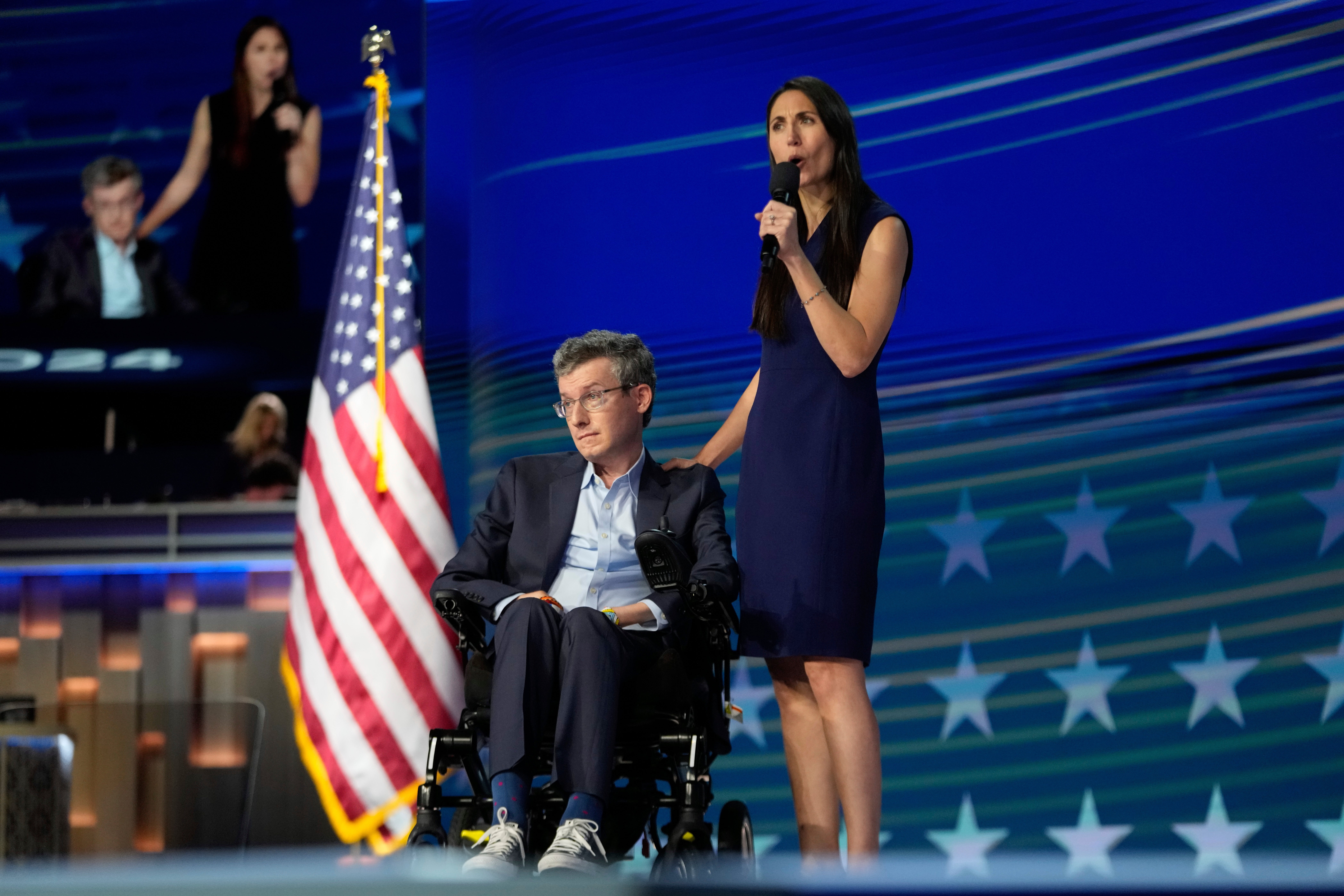 Brian Wallach and Sandra Abrevaya, health care advocates and founders of I Am ALS, speak during the Democratic National Convention Monday