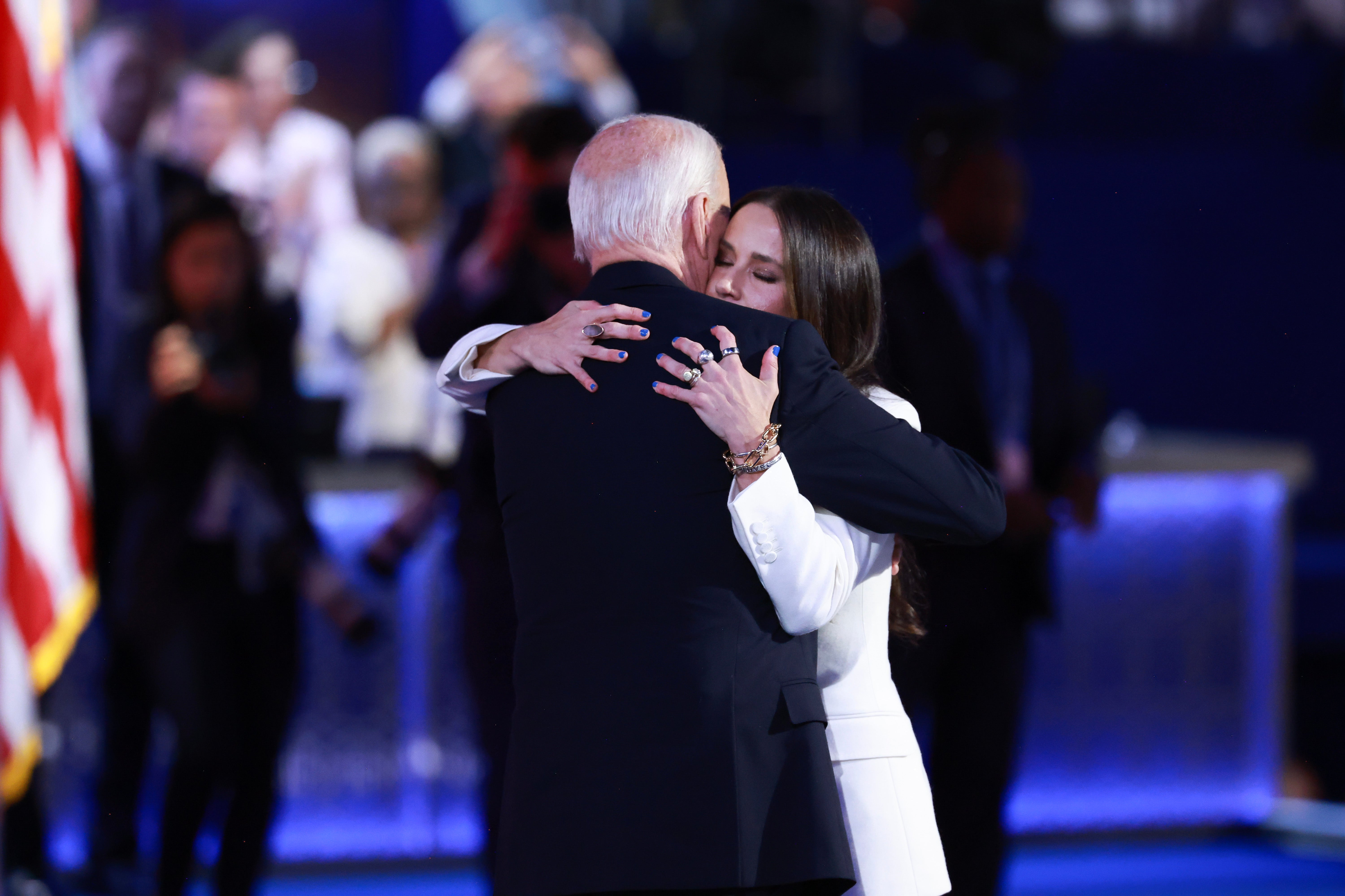 First Daughter Ashley Biden and President Joe Biden embrace on stage at the Democratic National Convention in Chicago on August 19.