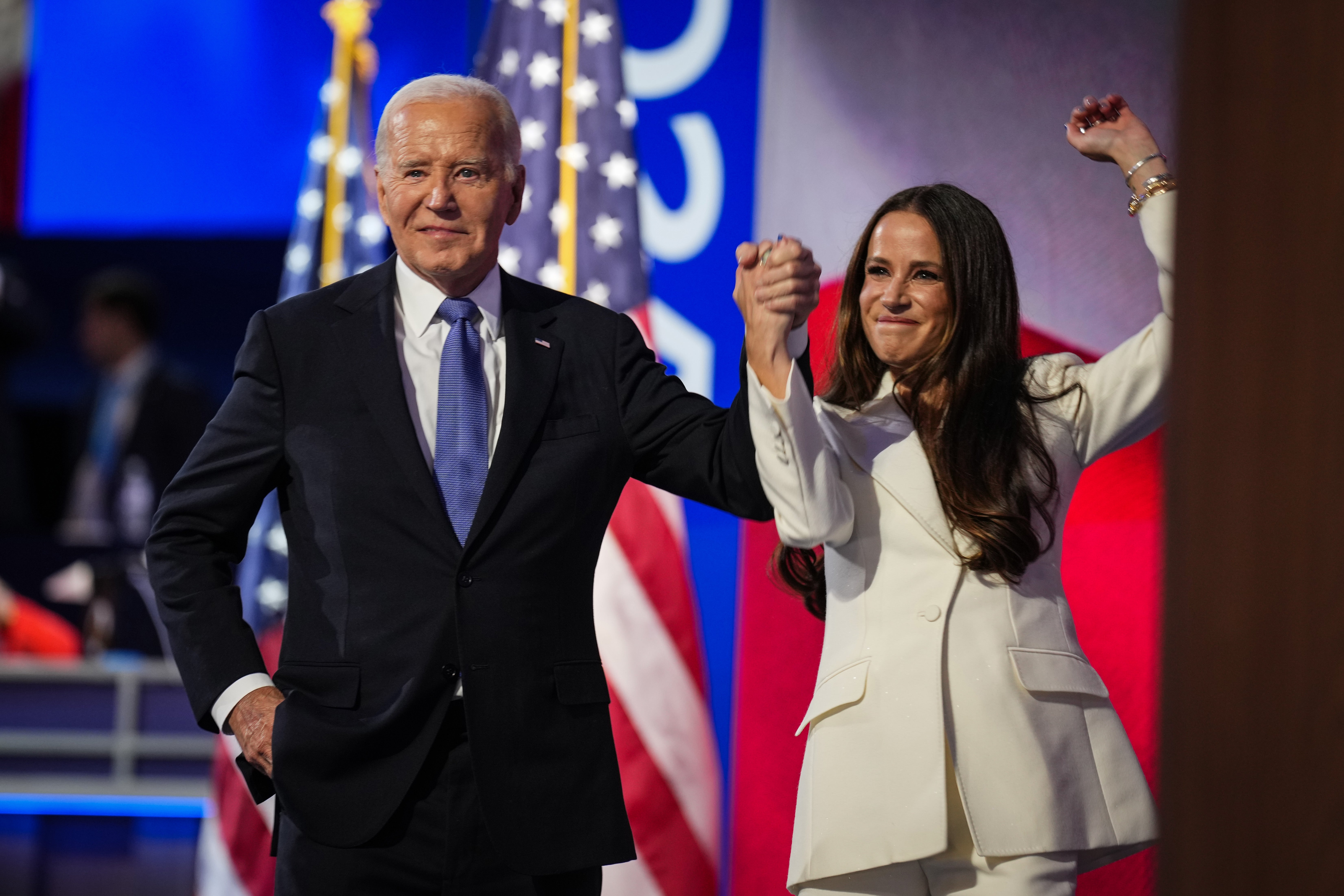 President Joe Biden greets First Daughter Ashley Biden as he takes the stage. Ashley Biden delivered a speech saying her father was the original ‘girl dad’ as he delivered his speech saying he would not seek re-election