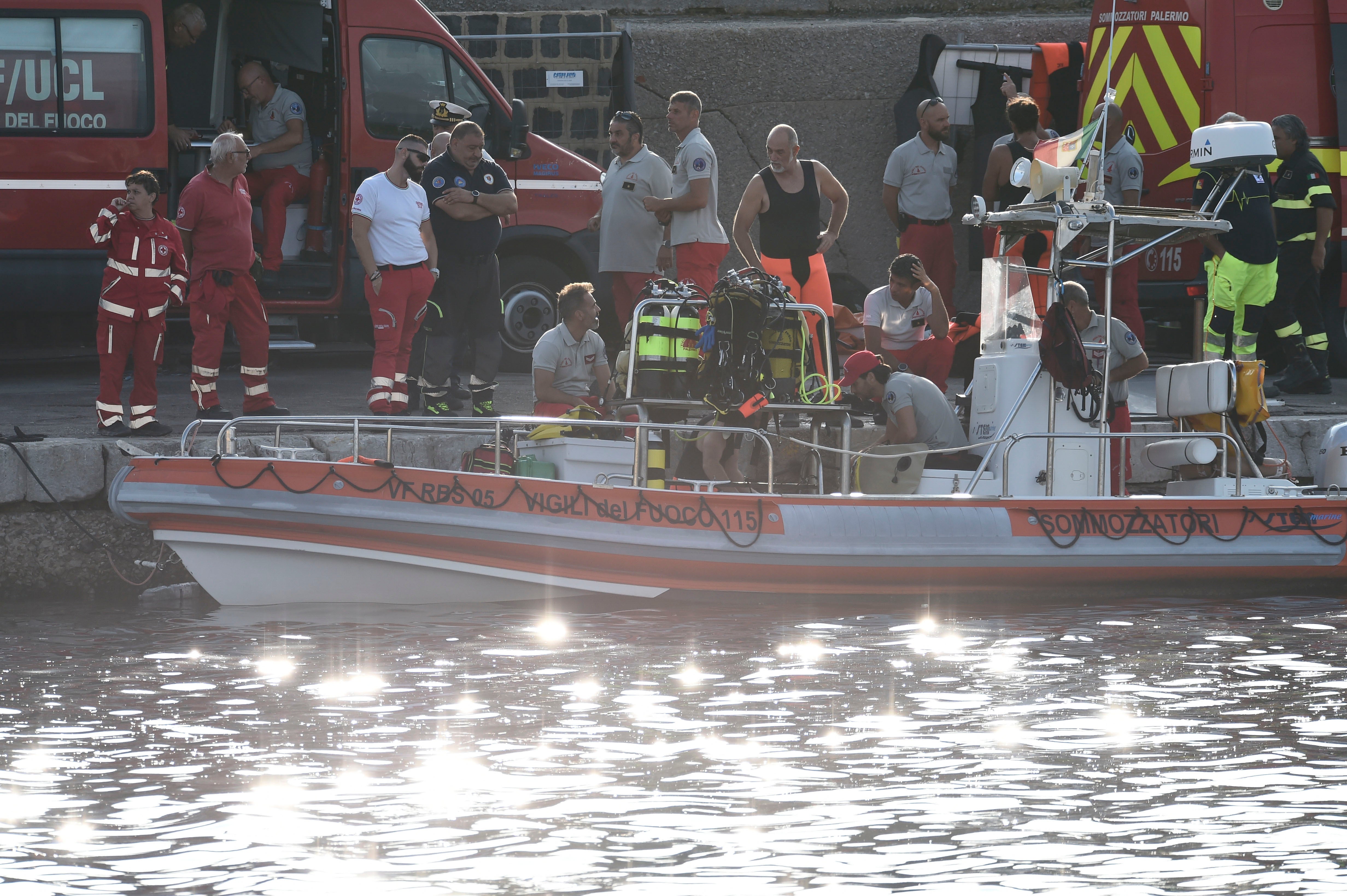 Italian firefighters and scuba divers docked at the harbor