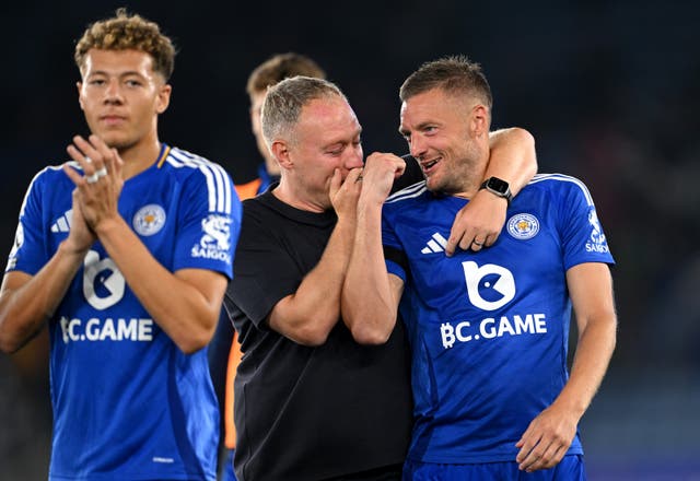 <p>Jamie Vardy jokes with manager Steve Cooper at full-time</p>