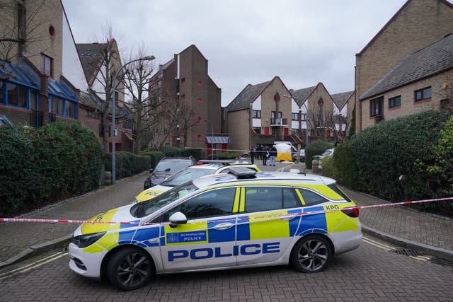 Police officers at the scene near Bywater Place in Southwark, south-east London (Lucy North/PA)