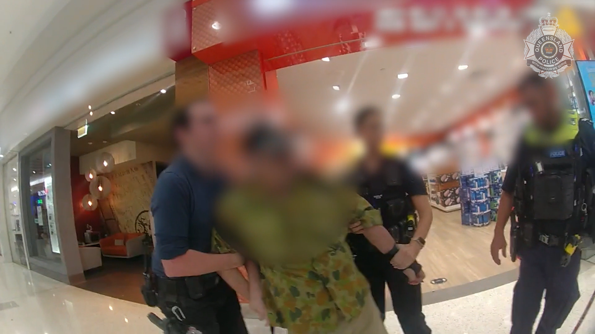 Bodycam footage shows moment the man is arrested in a mall by Queensland police