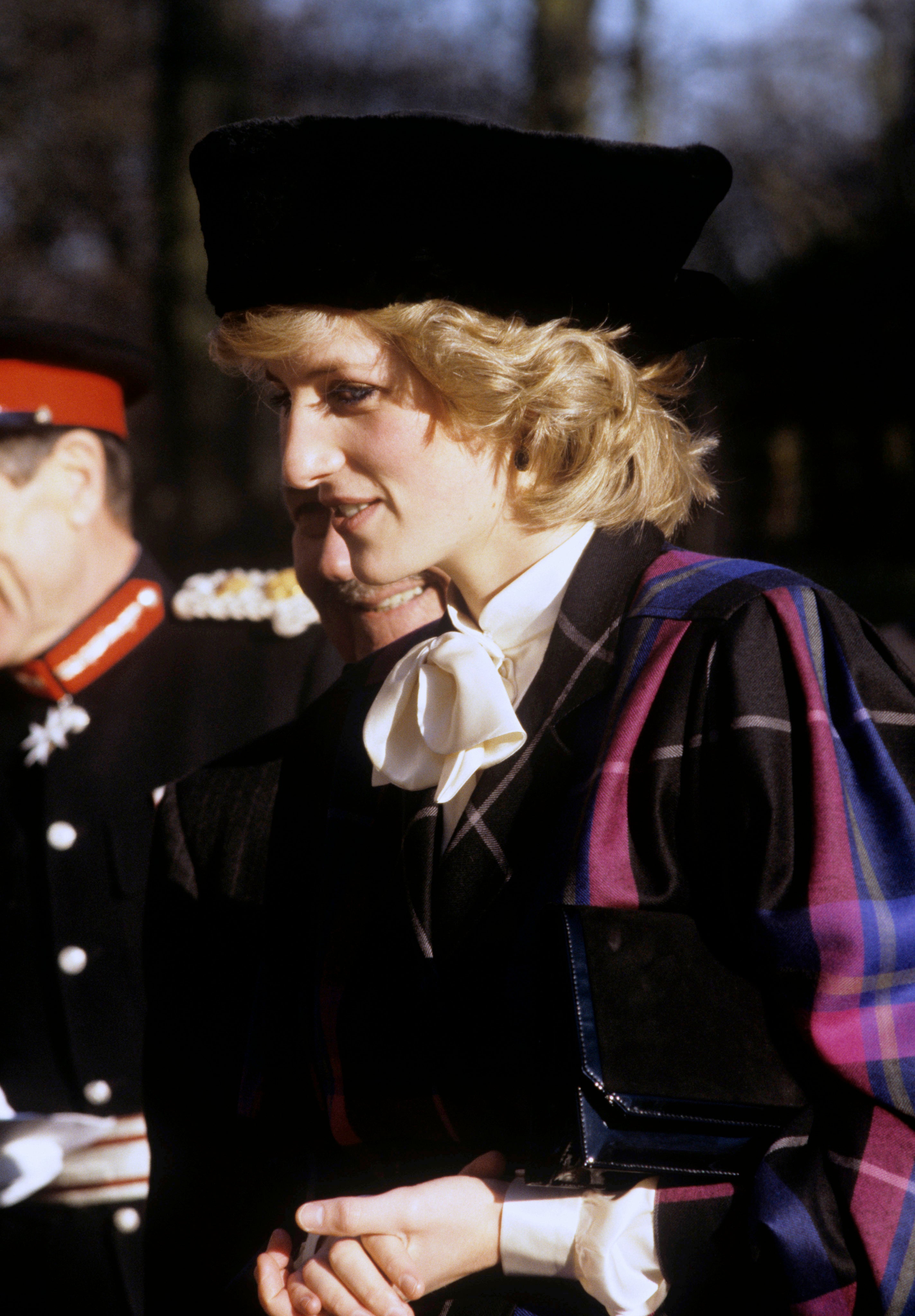 Diana, Princess of Wales, often wore bow-tied blouses and checked blazers during public outings (PA Archives)