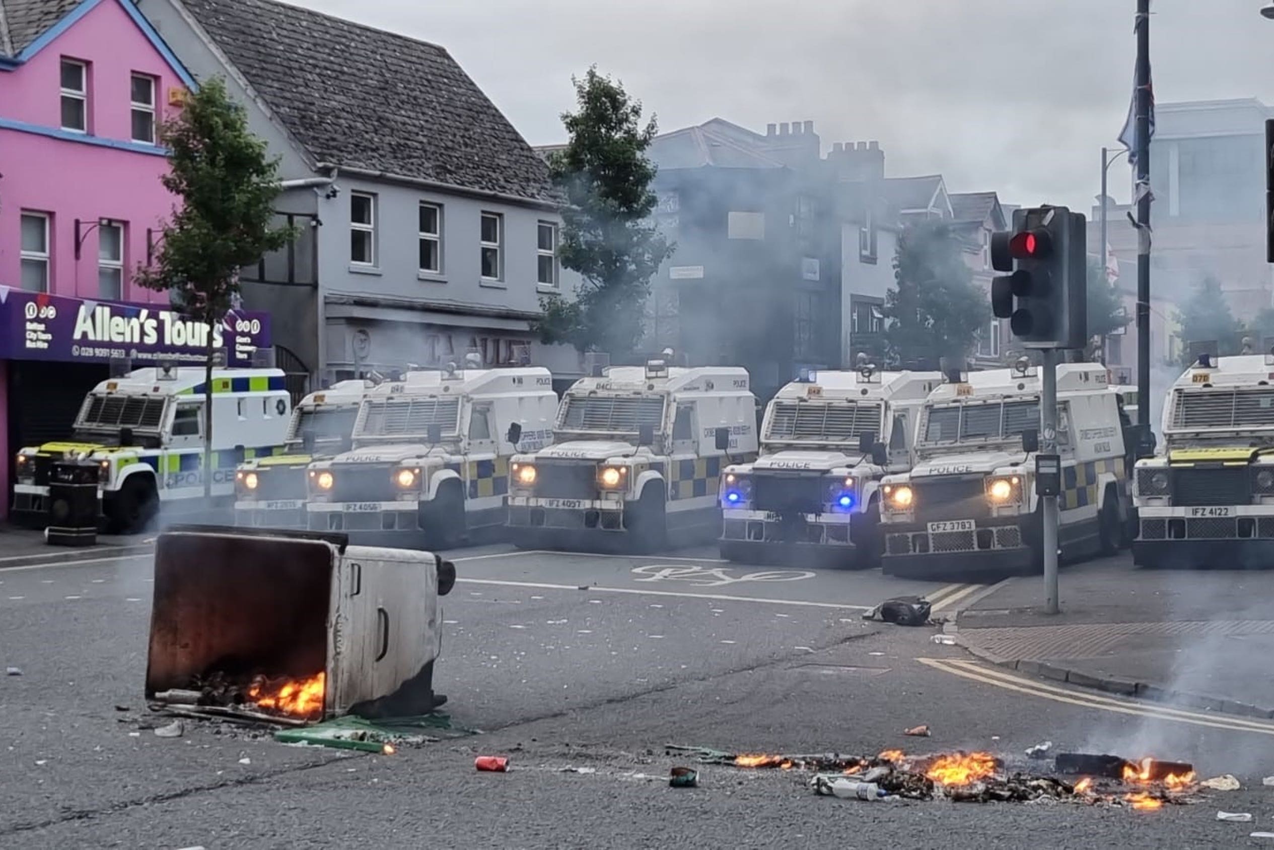 PSNI officers man road blocks in Belfast (PA)