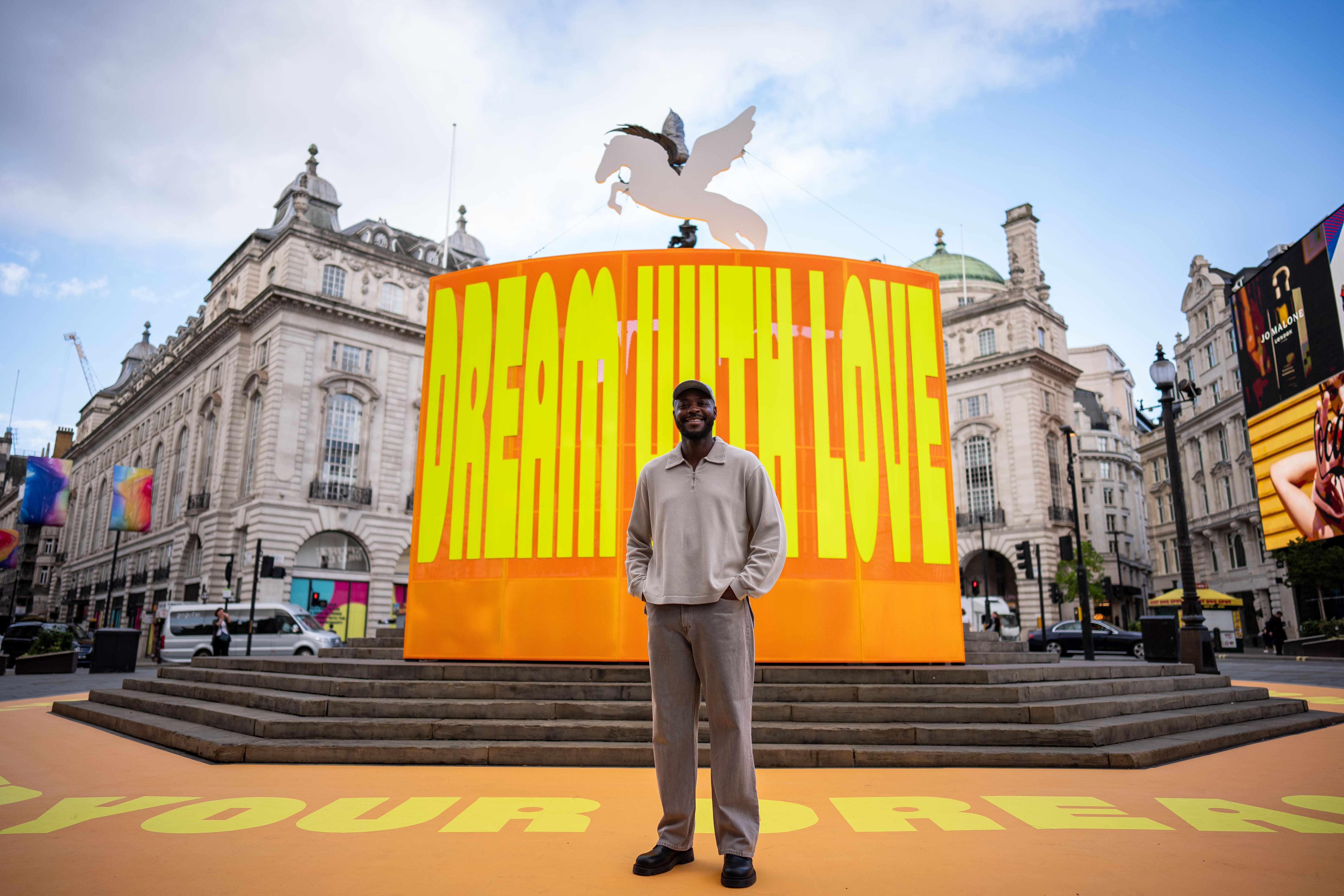 The launch of the new public art installation by artist Yinka Ilori at Piccadilly Circus in London (Aaron Chown/PA)