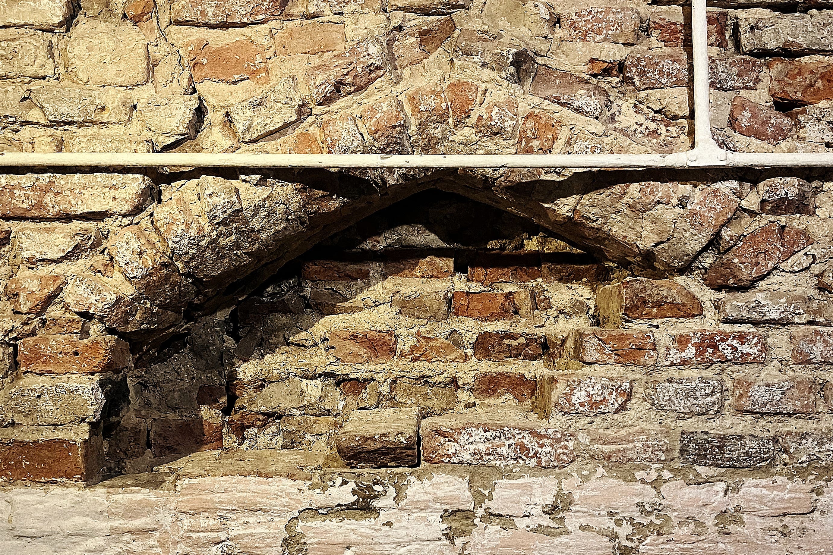 A 15th century door archway uncovered behind a wall at St George’s Guildhall in King’s Lynn, where Shakespeare is believed to have performed on stage (St George’s Guildhall/PA)