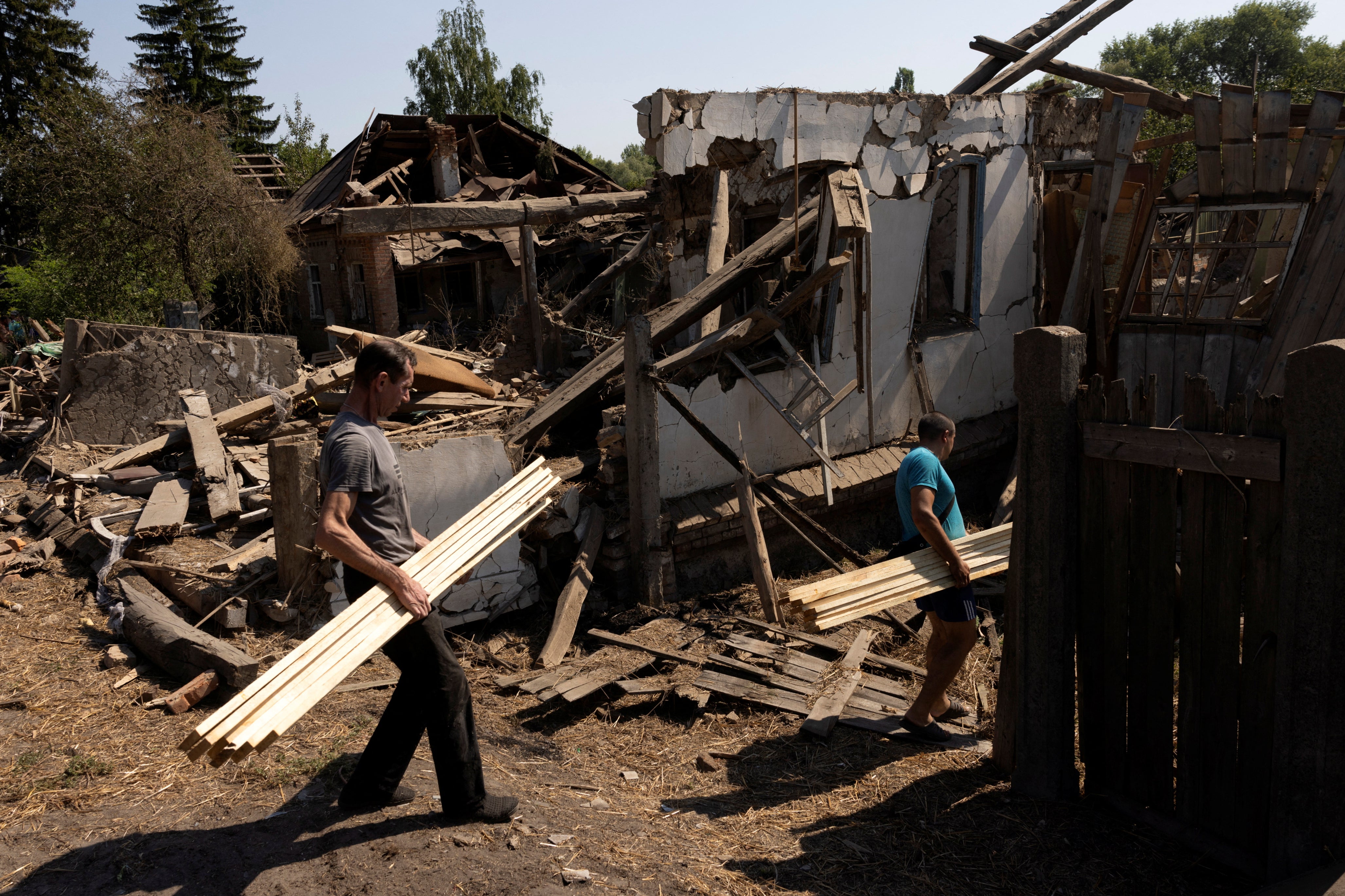 Residents work to fix damaged homes in Bilopillia