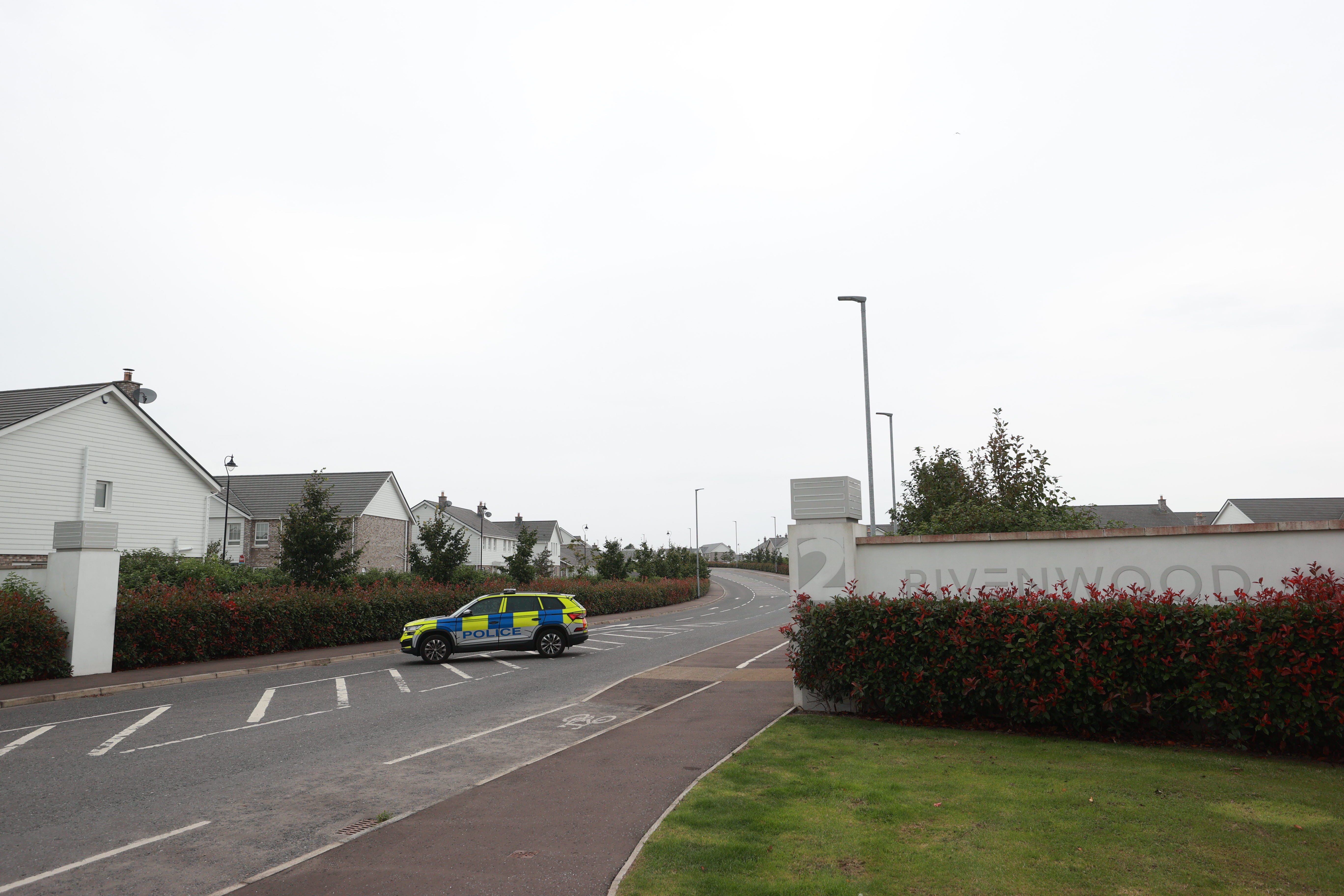 A police car outside the entrance to Rivenwood housing development in Newtownards, Co Down, where more than 400 homes have been evacuated due to an operation to clear a Second World War-era bomb (Liam McBurney/PA)