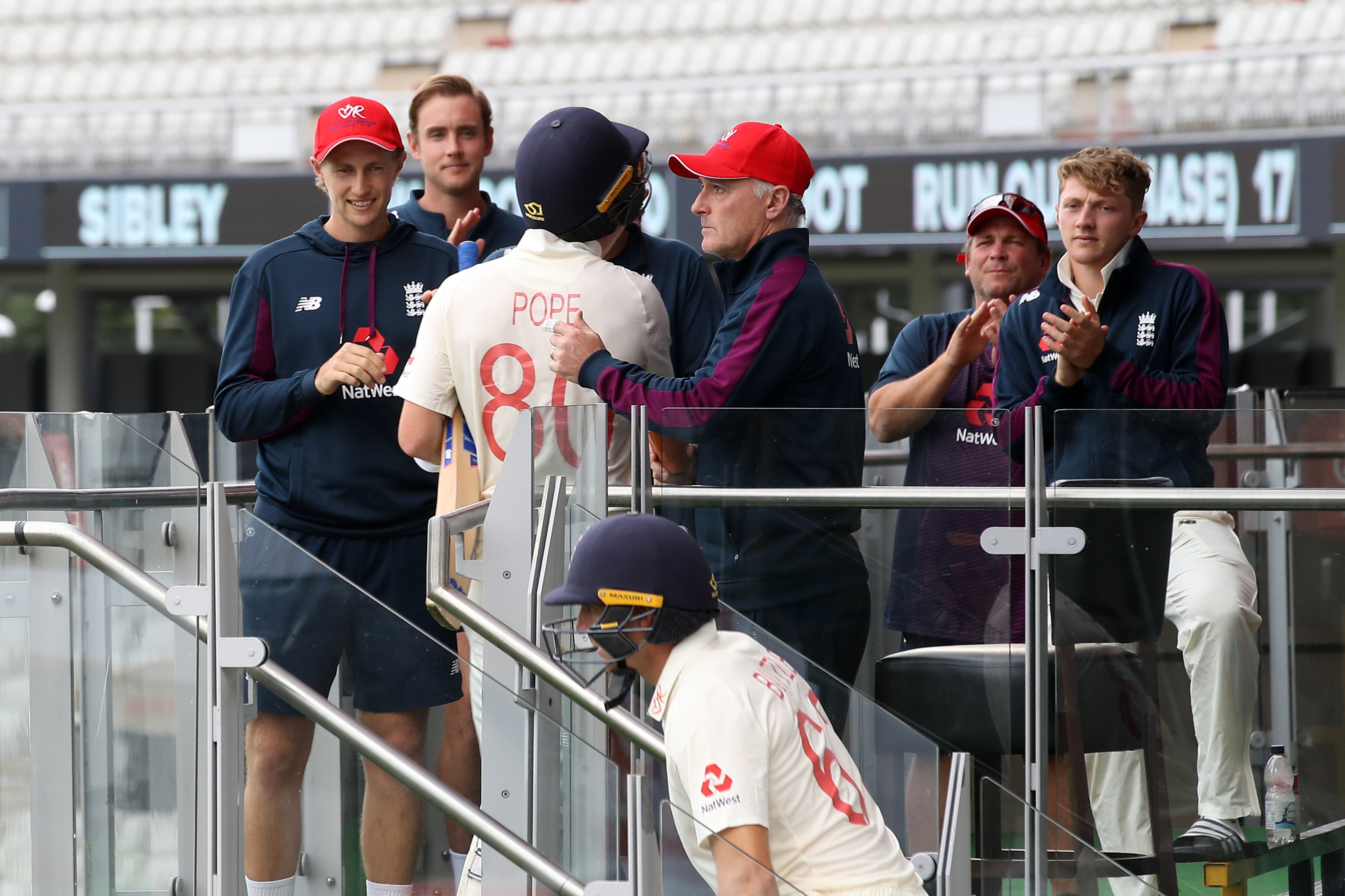 Pope is congratulated by Thorpe after day one of a Test match against West Indies in July 2020 (Martin Rickett/PA)