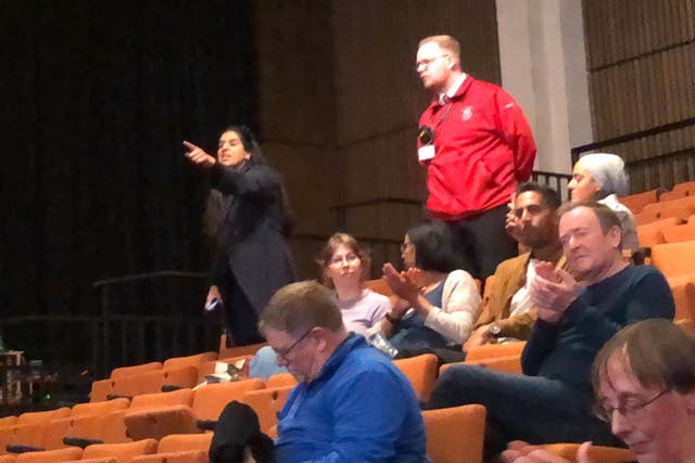 A pro-Palestine activist disrupting a talk event with John Swinney and Mark Drakeford, held at the Edinburgh International Book festival (Neil Pooran/PA)