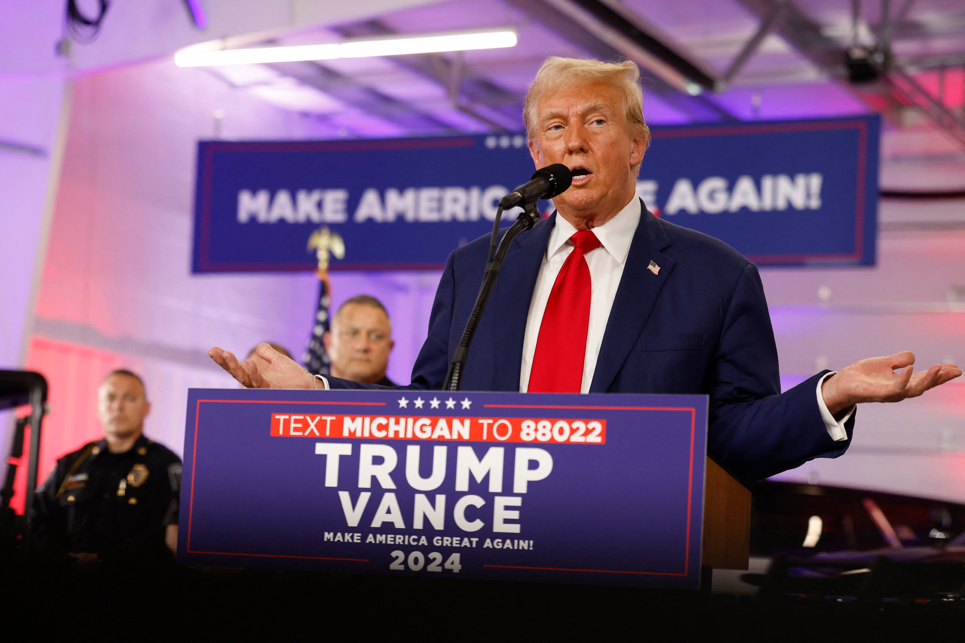 Donald Trump speaks from Michigan on August 20. His super PAC received $50m from a billionaire donor on Tuesday