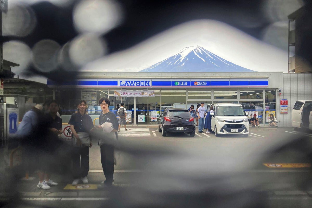 Japan takes down giant black screen blocking view of Mount Fuji ahead of Typhoon Ampil