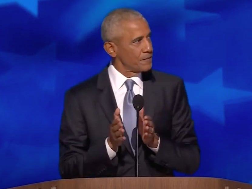 Barack Obama gestures while speaking about Donald Trump’s crowd size at the Democratic National Convention in Chicago on 20 August 2024