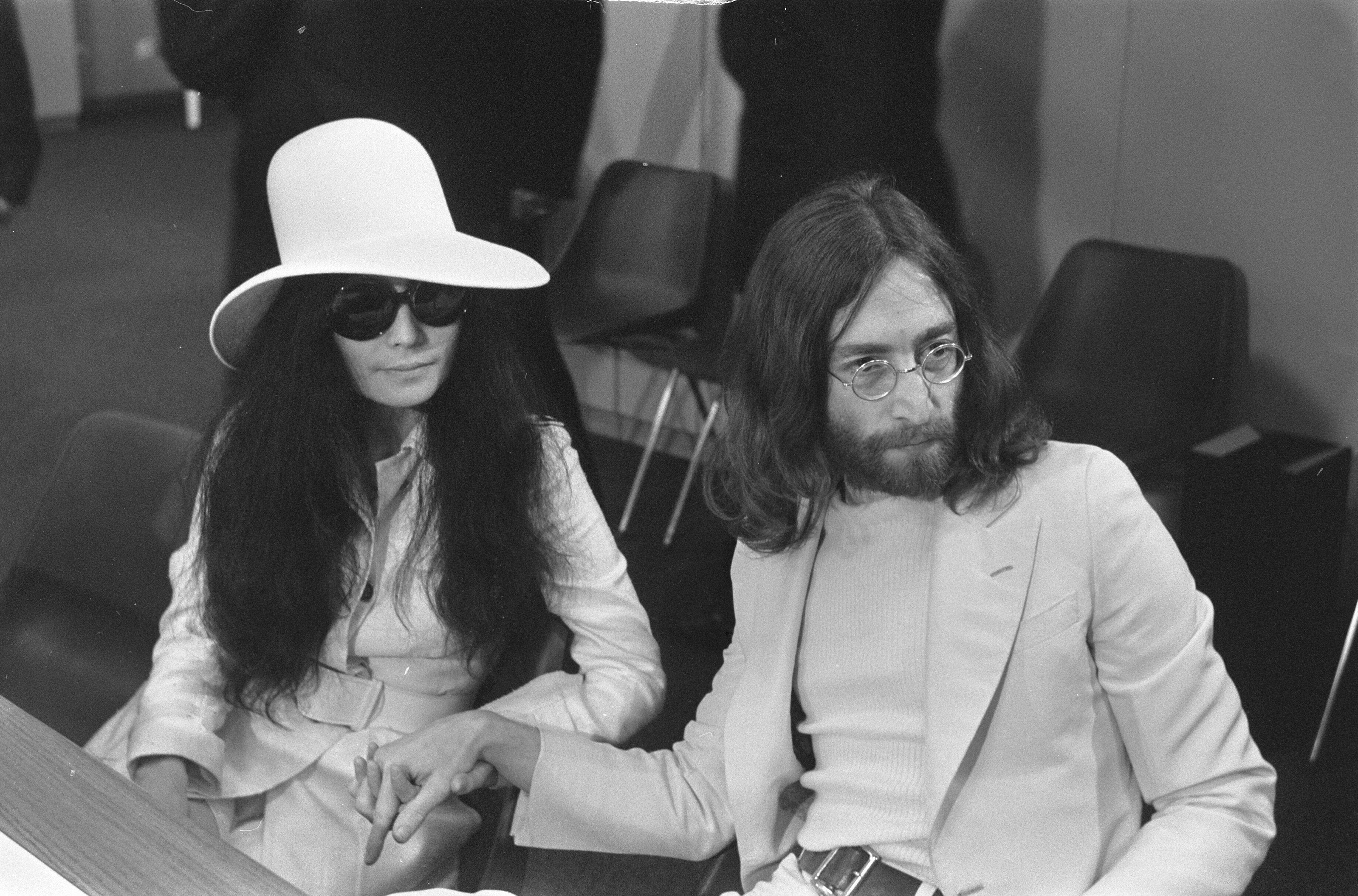 John Lennon and his wife, Yoko Ono, were renowned for being the most liberal of the group (Alamy/PA)