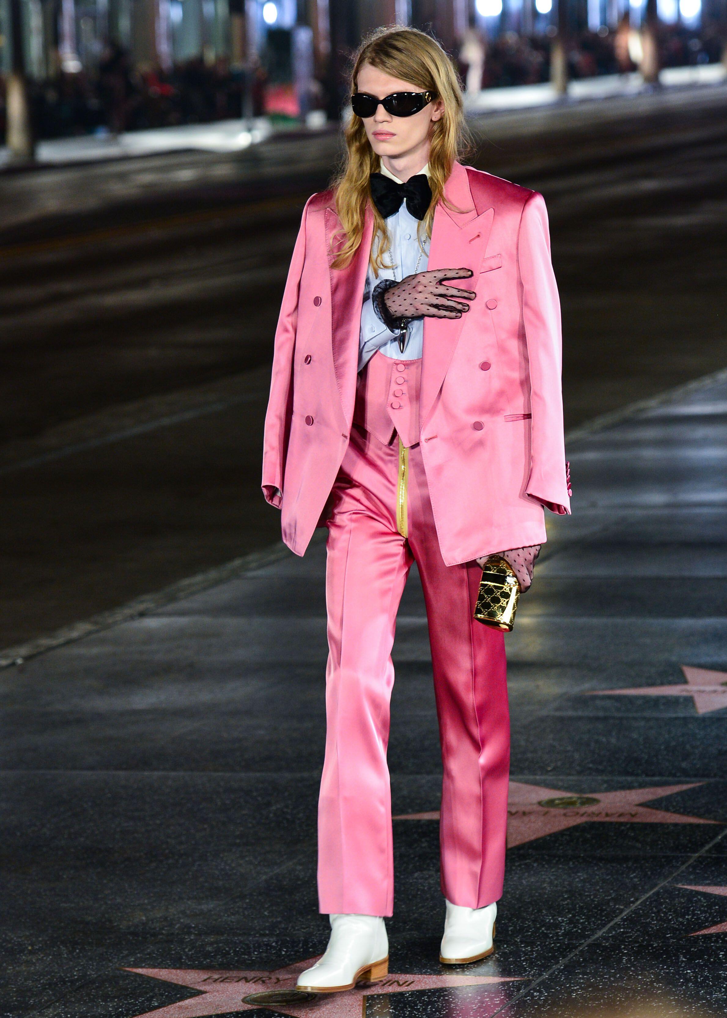 The Beatles’ bright and bold approach continues to inspire suit tailoring from Gucci to Saint Laurent (Alamy/PA)